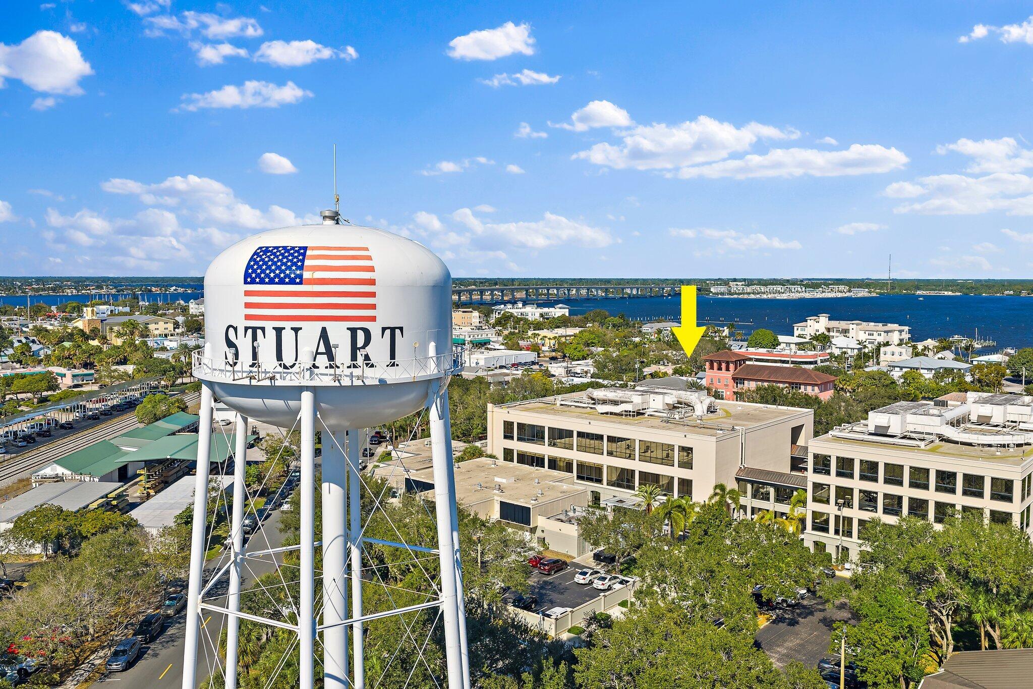 Live Where It All Happens - Downtown Stuart Step into this beautifully updated 2-bedroom, 2-bath apartment located in the heart of downtown Stuart, where charm, convenience, and modern style come together. Situated on the second floor, this light-filled home features impact windows, a private balcony, and a sleek modern kitchen complete with stainless steel appliances—perfect for both everyday living and entertaining. Both bathrooms have been tastefully remodeled, offering a fresh, spa-like feel. You'll also love the huge closet space and abundant storage, a rare find for downtown living. Bonus Convenience: Enjoy the ease of a full-size washer and dryer in the apartment.  With restaurants, shopping, waterfront spots, and entertainment just steps away, this offers an unbeatable lifestyle!