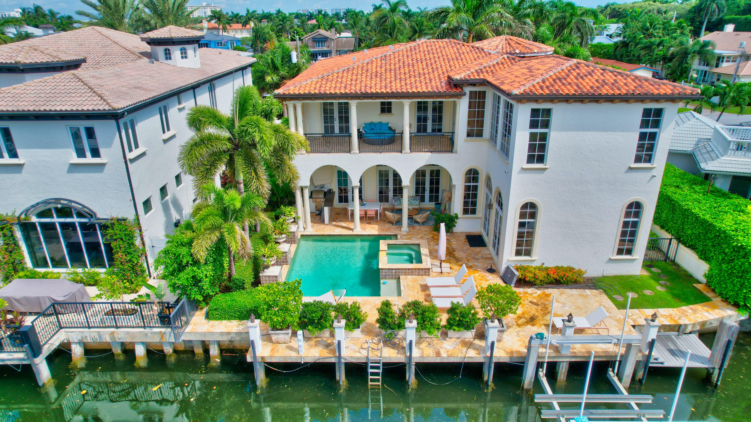 The best waterfront living just steps from the ocean in Delray Beach. This 5-bedroom, plus office beautifully appointed home has extensive indoor and outdoor living space.   Located on a deep water canal off the Intracoastal Waterway with 75 feet +/- with dock space with boat lift, the residence features high-impact glass throughout, gourmet kitchen, master suite, elevator and is lushly landscaped with private pool and spa. Located minutes away from Delray's Atlantic Avenue filled with art galleries, upscale shops, fine restaurants, nightly entertainment.
