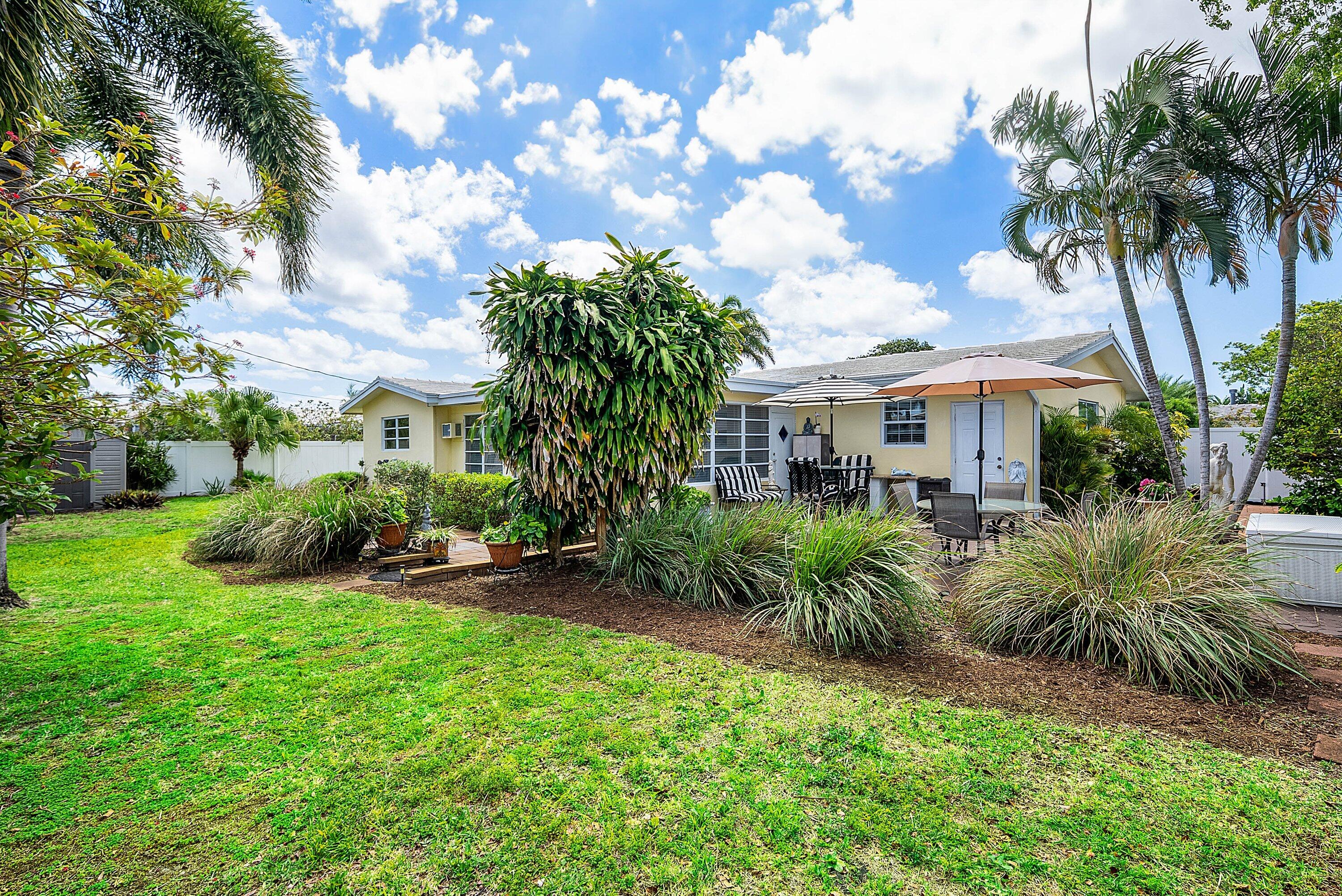 Nestled in the prestigious enclave of Lighthouse Point, this charming and impeccably maintained 2-bedroom, 2-bath home offers comfort, style, and an ideal location. An inviting open floor plan welcomes you inside, featuring elegant 24x24 porcelain tile flooring throughout, newer appliances, and a recently updated A/C for added peace of mind. A versatile den provides the option to easily convert into a third bedroom, offering added flexibility. Set on a spacious 9,000 sq. ft. lot, you can create your dream backyard, including space for a pool. The property is fully fenced with commercial-grade PVC and showcases beautiful landscaping, manicured lawns, and a sprinkler system on well water for easy maintenance. Located on one of the area's quietest streets, a truly peaceful setting.