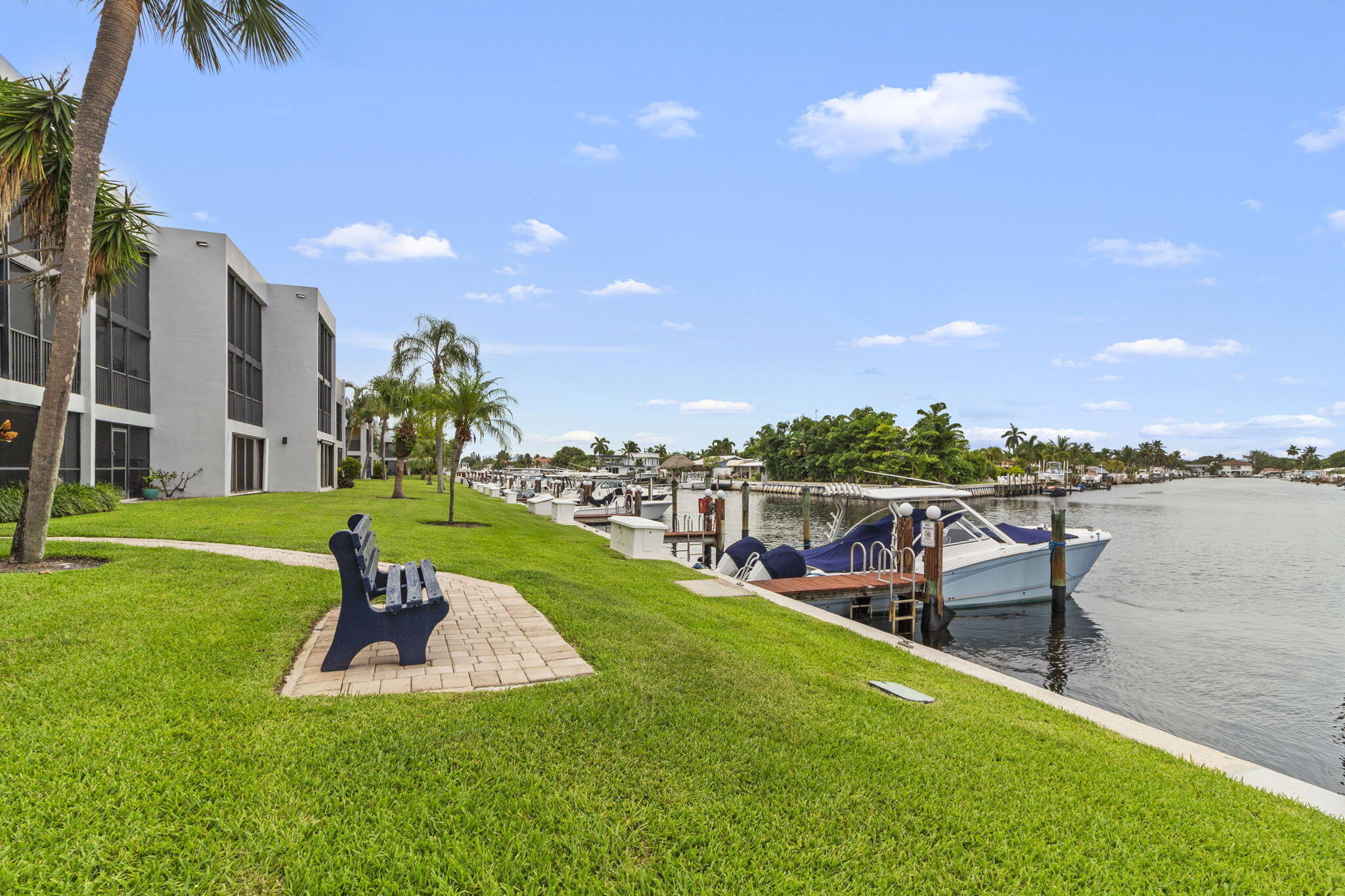 Boater's Paradise in the gated community of Nobel Point! Canal views and a parade of boats from both private balconies. Includes deeded dock w/ H20 & FPL paid for and maintained by HOA for a 42' vessel, with one fixed bridge to the ICW. Kitchen features granite countertops and soft-close cabinetry. Dry bar with accent lighting for entertaining. Crown molding, recessed lighting, custom closets, remote-controlled shades, and hurricane-impact skylights add style and function. Laundry room has New Washer & Dryer. Accordion Shutters for hurricane protection. 40 year certification done. 2025 Community improvements: New Roof, Pickleball courts, Pool, Hot Tub, and pool deck & BBQ Furniture. Enjoy the Fitness center, clubhouse, and car wash station. Pet-friendly. Parking for 2 cars, one covered.