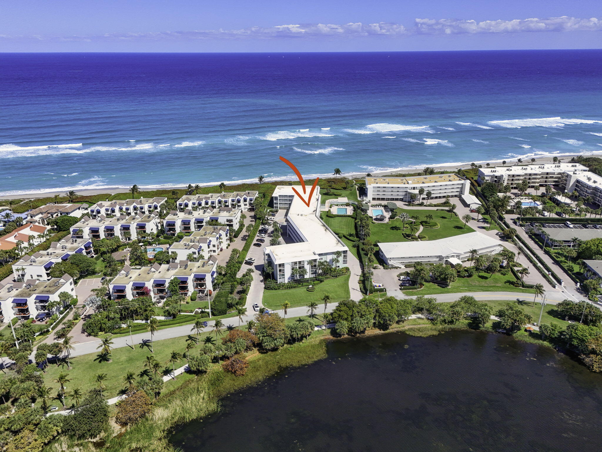 Wake up to the Atlantic Ocean breezes and end your day with sunset skies in this renovated top-floor 55+ condo at The Barclay in Juno Beach. This 2-bed, 2-bath coastal retreat offers ocean views from your private porch, with the beach just steps away. Beautifully updated from the designer kitchen with white soft-close cabinetry, granite countertops, stainless steel appliances, and wine fridge, to the seamless vinyl wood-look flooring throughout. Both bathrooms reflect a clean, modern coastal aesthetic with granite finishes and beautifully tiled showers. Washer/Dryer in the unit, impact sliders, recessed lighting complete the space, delivering both style and peace of mind. Deeded covered carport, private storage, pool, beach access, walk to restaurants & 20 minutes to PB airport. Some of the upgrades to unit 309 include; New A/C in 2023, Roof Replaced around 2021, Water Heater in 2021, Crown Molding in Living Room, Electrical was updated and Recessed Lighting,  Front door and Kitchen Door Replaced 2024, Impact Sliders Installed Leading to Balcony, The Balcony has Sliding Glass Panels and Sliding Screens with Motorized Window Shades, Window Blinds in Guest and Kitchen 2021, Built in Custom Closet in Primary. Juno Beach is the perfect location and ready for you to move in!