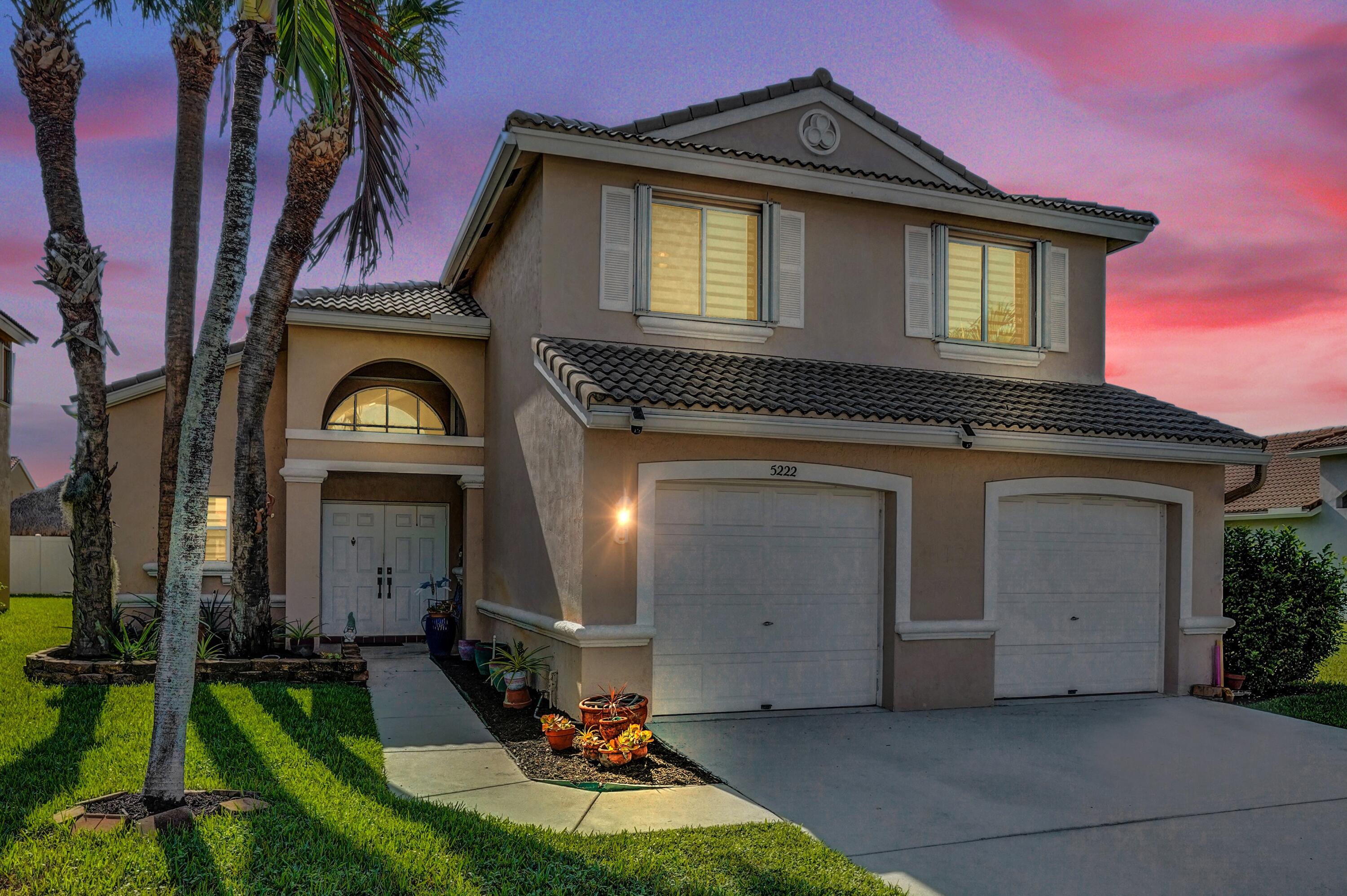 Welcome to this beautifully maintained Nairobi model located in the highly desirable gated community of Winston Trails, within the Prairie Dunes Village subdivision.   This spacious home offers 3 bedrooms, 2.5 bathrooms, a versatile loft, and a private screened-in heated saltwater pool overlooking a tranquil lake on an oversized lot.  The light-filled interior features soaring ceilings, upgraded blinds throughout, and new luxury vinyl flooring in the main living areas. The updated kitchen is equipped with white shaker cabinetry, quartz countertops, stainless steel appliances, and an open layout ideal for both everyday living and entertaining.  Upstairs, all three bedrooms are generously sized, along with a spacious loft that can easily be converted into a fourth bedroom. The primary   suite features cathedral ceilings and a beautifully renovated en-suite bathroom.  Enjoy Florida living from your private outdoor retreat, complete with a screened-in heated saltwater pool, expansive patio space, peaceful lake views, and an oversized lot with a neighboring easement for added privacy. Additional features include partial accordion hurricane shutters and a 2019 water heater.  Winston Trails offers exceptional amenities with no mandatory golf or country club membership fees, including a 24-hour manned guard gate, resort-style community pool, children's pool, tennis and pickleball courts, and two playgrounds. The Winston Trails Golf Club, located within the community, features an 18-hole public golf course, driving range, The Trails at Winston restaurant, and Science of Fitness with gym memberships and fitness classes available.  Conveniently located near shopping, dining, hospitals, and major roadways, this home is also zoned for highly rated schools, including Manatee Elementary School, Christa McAuliffe Middle School, and Park Vista Community High School. HOA dues include high-speed Comcast cable and internet. A one-time capital contribution equal to four quarters of HOA dues is due at closing. Don't miss the opportunity to make this exceptional home your own.  INFORMATION HEREIN NOT GUARANTEED AND SUBJECT TO ERRORS & OMISSIONS. ALL MEASUREMENTS ARE APPROXIMATE.