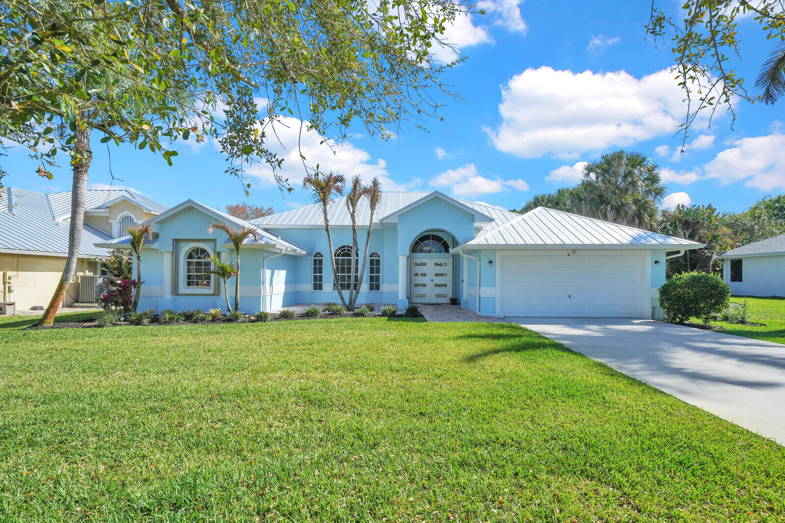 STUNNING &  Large 4 Beds/2.5 Baths Home on OVERSIZED Lot, PERFECT for All of your Toys. Take your Boats right out the Community Boat ramp straight to the St. Lucie Canal, leading you straight to the Ocean. Enjoy the Freedom of living in a Gated Community that allows you to still Live the TRUE Florida Lifestyle OR Prefer to stay home? Do just that while enjoying your Screened in Pool, Hot Tub & HUGE Yard to add anything you prefer to enjoy YOUR home. Best PART, house backs to a Preserve giving you natural Privacy. This is the ONE house that has it ALL! $250K in Renovations from Kitchen to Bathrooms, New Roof, HVAC & Water Heater & more. Hidden Gem in the Most Peaceful & Scenic part of PSL with the Lowest HOA in town & NO HOA APPROVAL REQUIRED!! This one WILL check ALL of YOUR boxes!