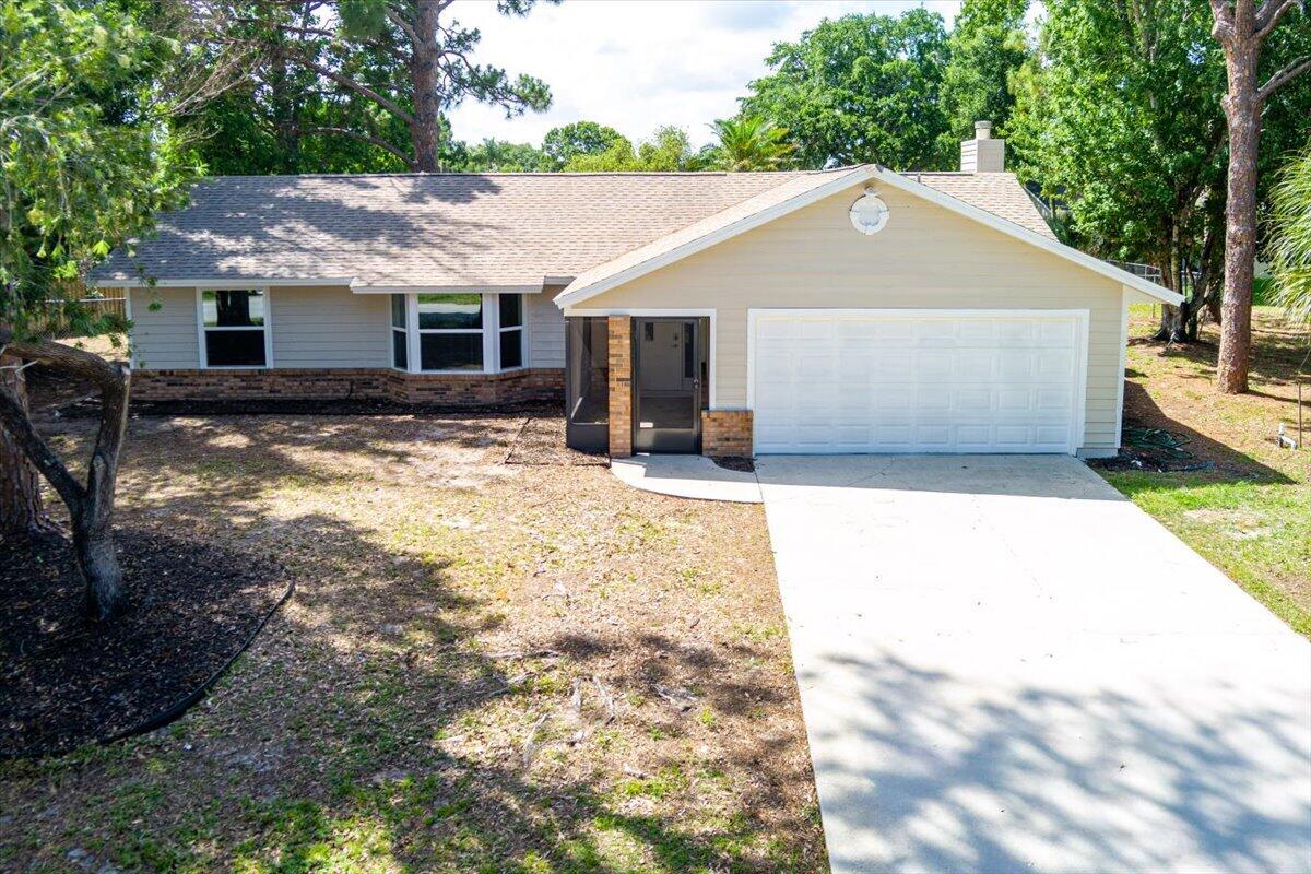4 BR, 2 BA totally updated. Exterior features all new thermo windows t/o, garage door with EGDO, new springs & rail, Architectural roof installed 2020. Freshly painted screened in patio with 24x24 tile floor and new lighting. New garage access doors, frosted glass door in family. .37 fenced in lot. Interior features new vinyl flooring t/o. 6" baseboard, wide window & door casing. New 2 panel doors, 7  ceiling fans & new light fixtures. LED can lighting t/o most of home. Kitchen features 42" white shaker soft close cabinets, quartz counters, big island center, ceramic backsplash, deep SS sink & SS appliances, all new except microwave )2020). Lg Master bedroom with big walk in closet. Both baths updated with light up mirrors, vanity, tile floor & walls. Split to be installed in family room.