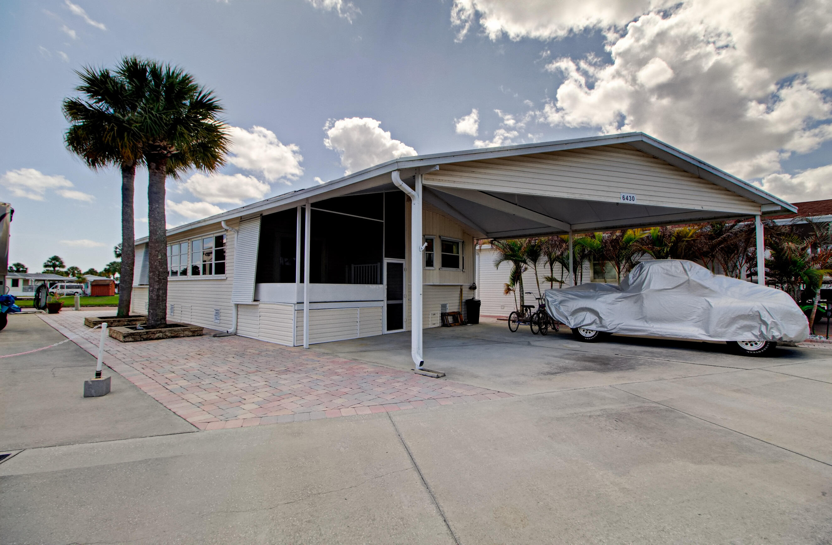 Located in Ancient Oaks, a 55+ community.  This incredible 2 bedroom, 1 and half bathroom home has a pond view, large windows and amazing rear patio area.  Key features include a large living area, open kitchen, ample covered parking, large laundry/utility room, and more.  Call today for more details.