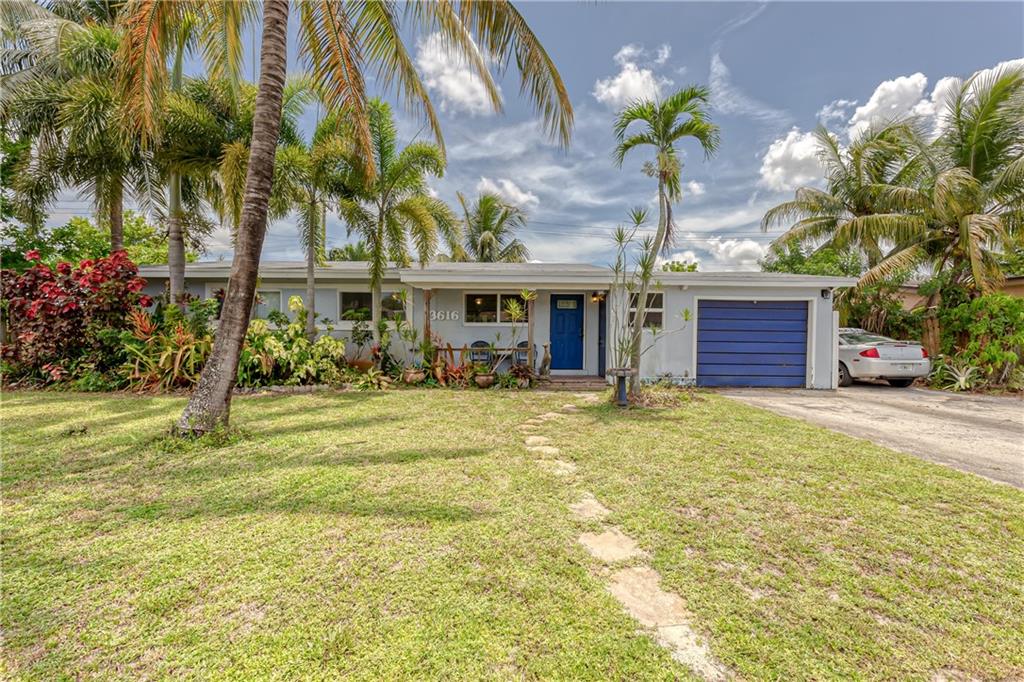 Charming curb appeal with this home in quaint Sunset area. Updated kitchen with stainless steel appliances, granite counters, newer front load washer/dryer, spacious dining and living area, terrazzo floors throughout.  Third bedroom wall removed, was used as an open office (can easily convert back if desired). Guest bathroom has "old Florida" charm, updated master bathroom. About 2/3 of the home has high impact windows.  BRAND new roof in 2022. A/C was replaced in 2017. Massive one car garage offers plenty of extra storage space. Very large lot has plenty of room for a pool. Covered back patio and covered front porch gives plenty of outside space offering shade.  Home gets a good amount of natural light and offers a great location, sidewalk community close to the airport and downtown!