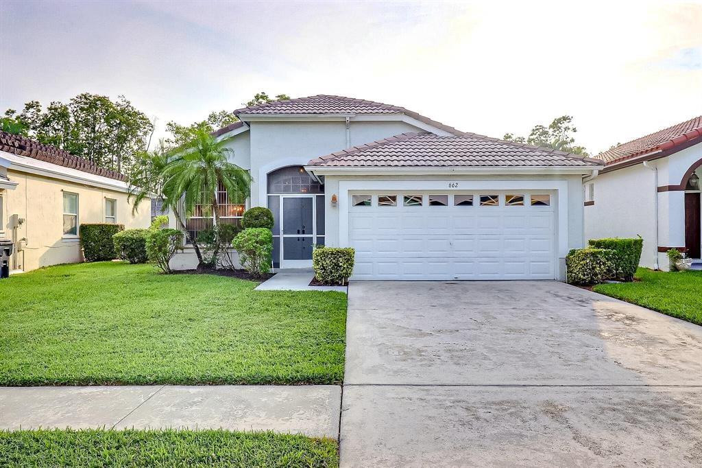 AMAZING! This 3 bed 2 bath CANAL FRONT home w/ LOW HOA is located in Wellington's A-RATED SCHOOL DISTRICT in highly-desirable Monterey on the Lake. The spacious layout features 2 living/dining areas & an open kitchen that receives tons of natural light throughout. The master enjoys canal views, large walk-in & en-suite bath w/ dual-sink vanity & frameless shower. The other 2 bedrooms both have large closets & get to enjoy a 2nd full bath w/ shower/tub combo.  Located minutes from A-RATED schools, dining, shopping & the World-Renowned Wellington Equestrian Center! Upgraded Kitchen!!