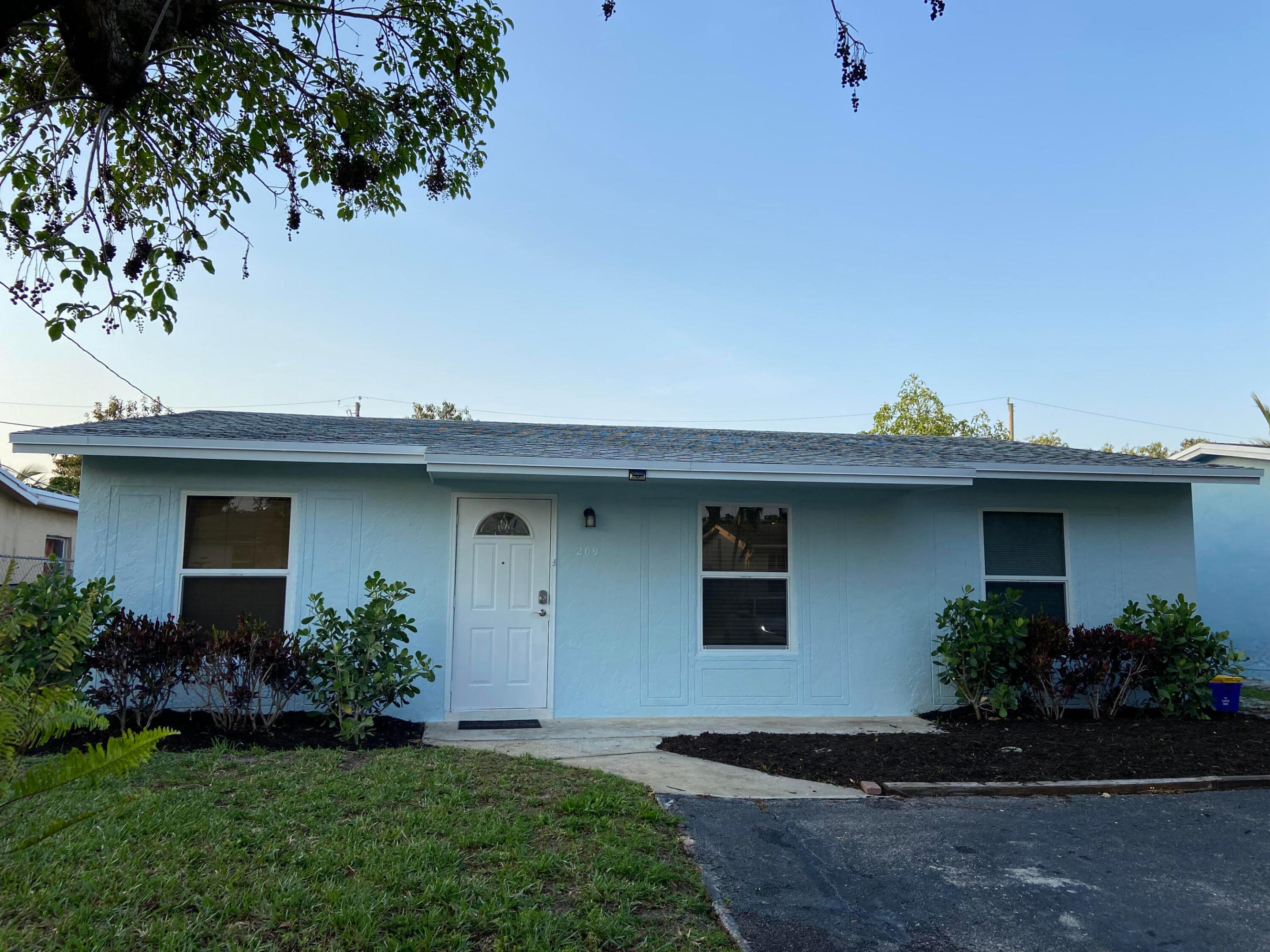 Beautiful and completely remodeled single family home, amazing East Boca Raton location, fully fenced in backyard with 3 bedrooms and 2 bathrooms. Brand new kitchen, appliances, washer/dryer & hot water heater. All Impact rated windows and doors. Brand new wood look ceramic tile throughout. A short bike ride to beaches in either Boca or Delray. Pets OK & Close to FAU. No HOA!