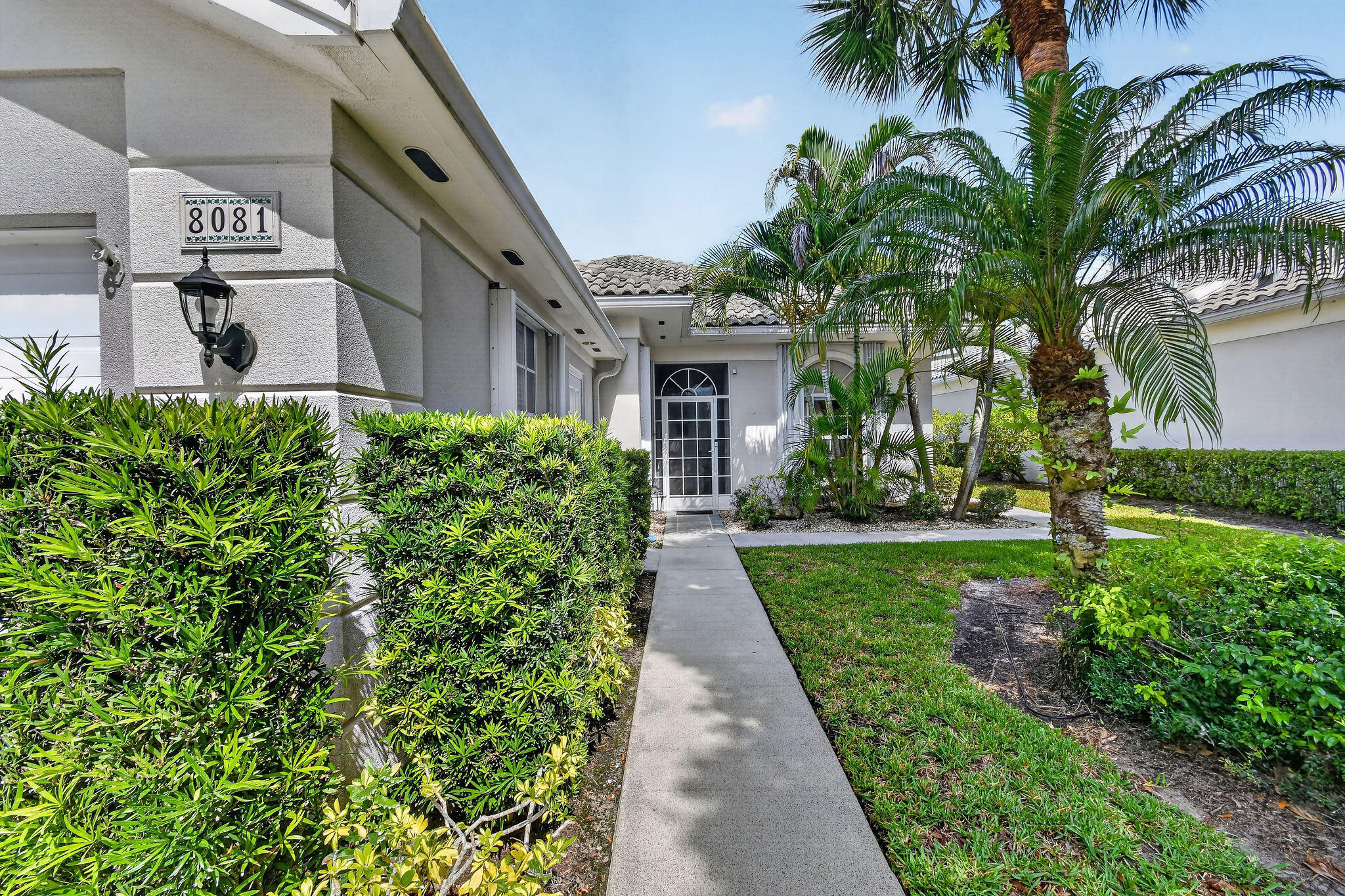 Priced to Sell! Great Location! Enjoy resort-style living in the desirable gated enclave of Lost Lake. This furnished 3BR/2.5BA home overlooks the 8th fairway of the renowned Tom Fazio-designed golf course and offers a spacious open floor plan with volume ceilings, neutral tile flooring, built-in shelving, and abundant natural light. The bright kitchen features ample cabinetry, generous counter space, and a breakfast bar that opens to the dining and living areas. Large sliders lead to an expansive screened and covered lanai, perfect for entertaining or relaxing while enjoying peaceful golf course views. Community amenities include 2 pools, spa, tennis, bocce, and optional golf membership. Sold As-Is with Right to Inspect. Move-in ready!