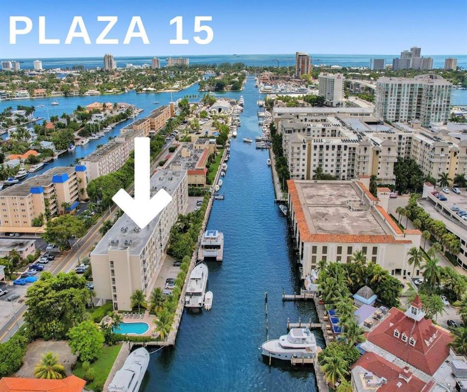 Located in Ft. Lauderdale near all the action, this charming 2/2 condo with balcony is bright & spacious! Main living area is large enough for living, dining & an office area, if needed. Kitchen has granite counters. Washer & dryer in unit. Large master bedroom has a huge walk in closet. 2 cars permitted & includes one covered assigned parking space and tons of guest parking for the 2nd vehicle. Plaza 15 is an impeccably maintained building with a waterfront pool, bbq area & doggy park. There are security arms to the main parking lot, fob secured entrance, lobby, fitness center and 2 elevators for residents & guests to use. Close to the beach, downtown, Las Olas, walk to tons of restaurants and shopping, airport & I-95/595.  Harbordale ES, Sunrise MS & Ft Lauderdale HS