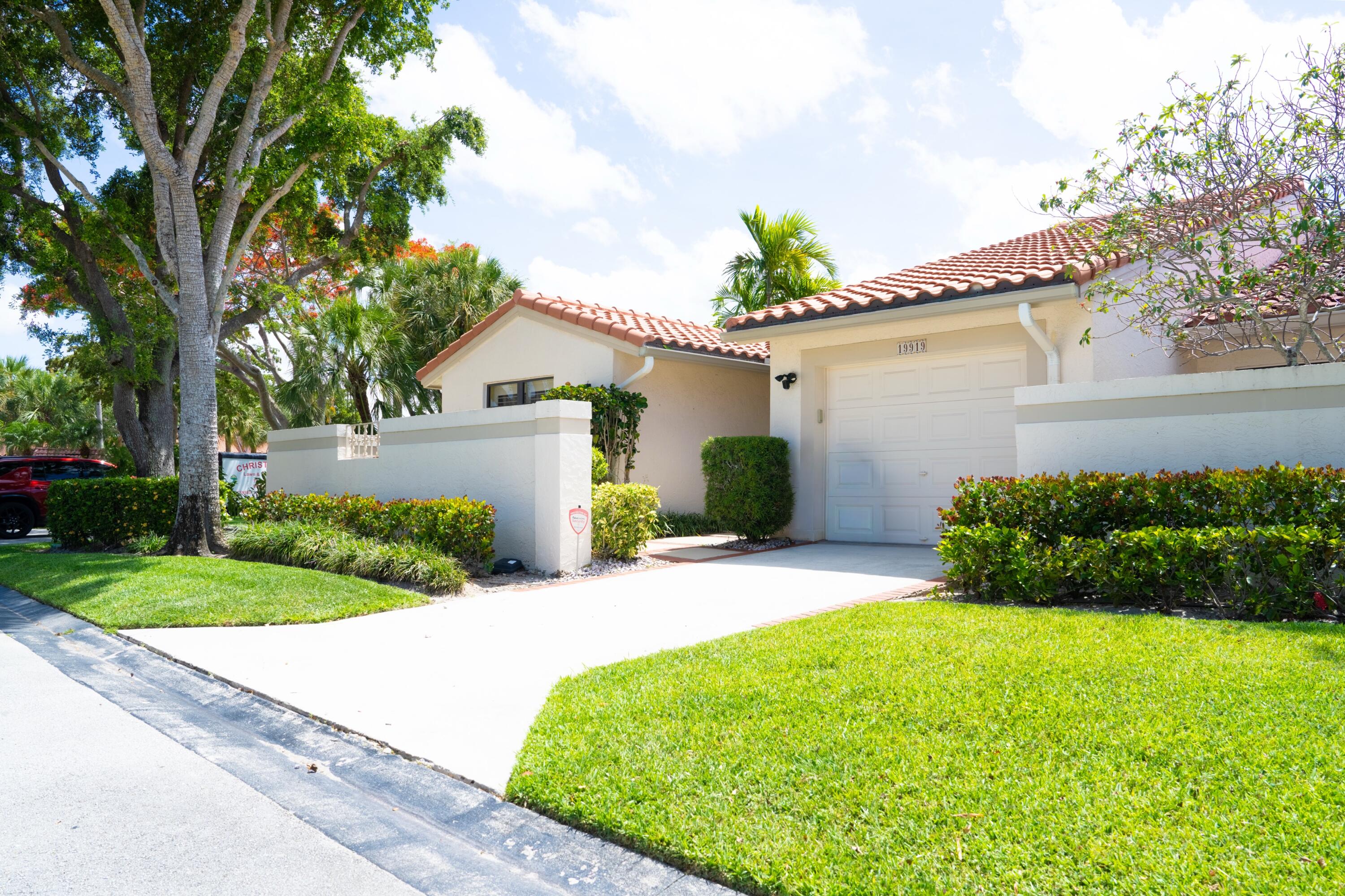 Welcome to this bright and beautifully updated corner villa in the gated community of Brentwood of Boca. This spacious single-story home offers 3 bedrooms, 2 bathrooms, and a desirable split-bedroom floor plan for added privacy. Enjoy peaceful waterfront living from the large screened private patio overlooking the serene lake and fountain. Features include impact windows for added safety, new bedroom flooring, newer A/C, newer high-end appliances, updated bathrooms, power blinds, and a separate indoor laundry room. The community offers beautiful amenities including two pools, spa, fitness center, tennis, and a modern clubhouse. This Low HOA, move-in ready home is perfectly located near world-class shopping, multiple parks, top-rated schools, and a short drive to the beach.