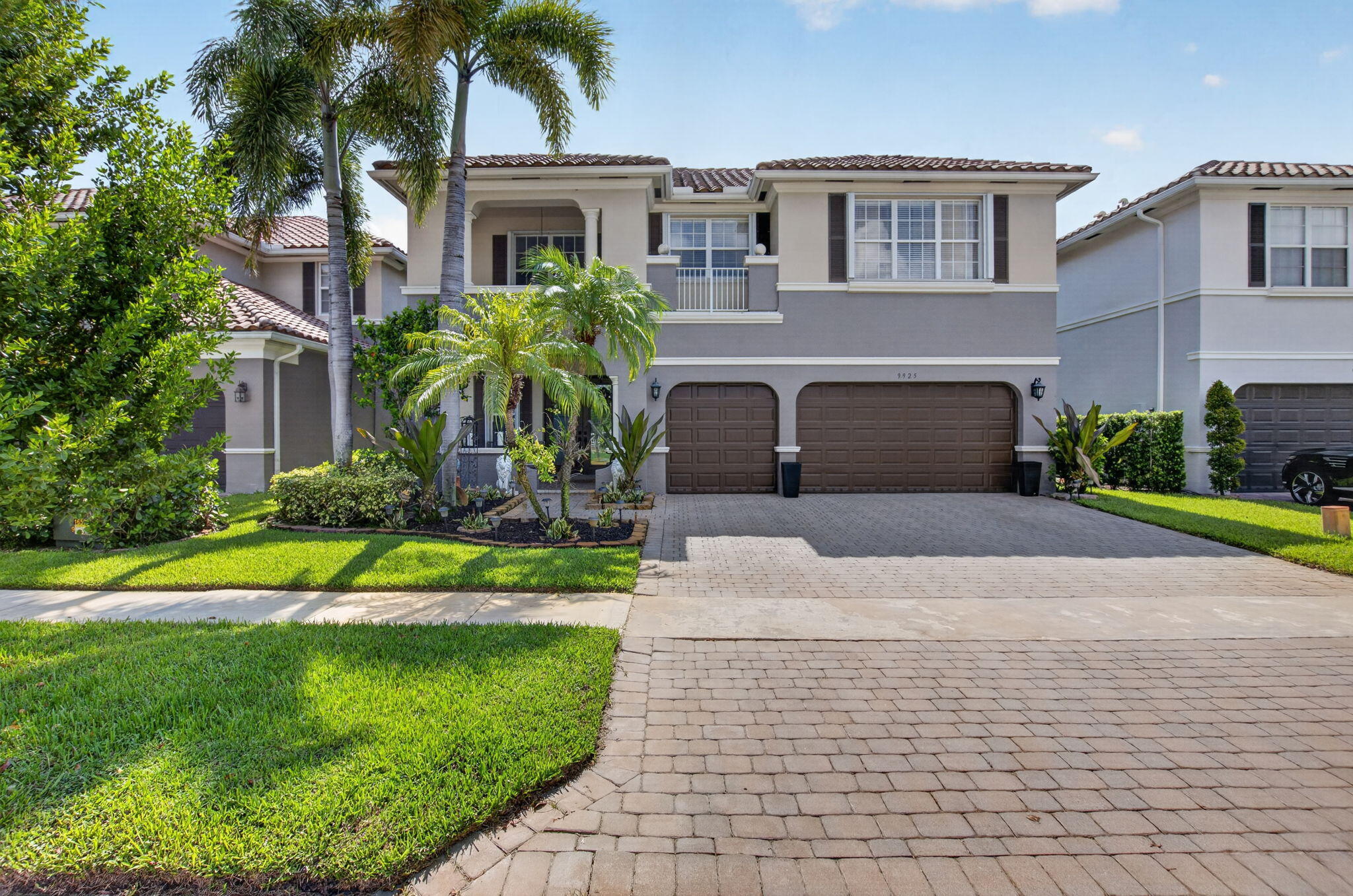 Welcome to 9925 Cobblestone Creek Drive, an exceptional residence nestled within the prestigious gated community of Cobblestone Creek. This stunning move-in ready two story estate offers 4 bedrooms, 3 bathrooms, den/ office and 3,396 square feet of thoughtfully designed living space, blending timeless elegance, modern comfort, and refined South Florida living. A grand foyer welcomes you with soaring ceilings, and abundant natural light that fills the home. The gourmet chef's kitchen is beautifully appointed with granite countertops, a center island, stainless steel appliances, a designer tile backsplash, and extensive custom cabinetry. Seamlessly connected to the spacious family room, this open-concept layout is ideal for both everyday living and entertaining. A private guest suite is conveniently located on the main level, while the luxurious primary retreat awaits upstairs. The expansive primary suite features elegant French doors leading to a fully upgraded extended balcony spanning the length of the home, perfect for enjoying peaceful mornings and sunset views. Additional highlights include dual custom walk in closets, tray ceilings, dual vanities, a soaking tub, and a spacious walk-in shower. The second floor also offers Three additional bedrooms and an oversized loft, providing endless flexibility as a media room, game room, home office, fitness space, or potential fifth bedroom. Additional features include a three-car garage, hurricane accordion shutters, elegant finishes throughout, and a desirable east-facing 6,617-square foot home with ample room to add a custom pool. Residents of Cobblestone Creek enjoy resort-style amenities including a clubhouse, fitness center, swimming pool, and 24 hour gated security. Ideally located near top rated schools, premier shopping, dining, entertainment, and South Florida's beautiful beaches, this exceptional property offers the perfect combination of luxury, convenience, and lifestyle. Experience the best of Boynton Beach living. Schedule your private showing today.