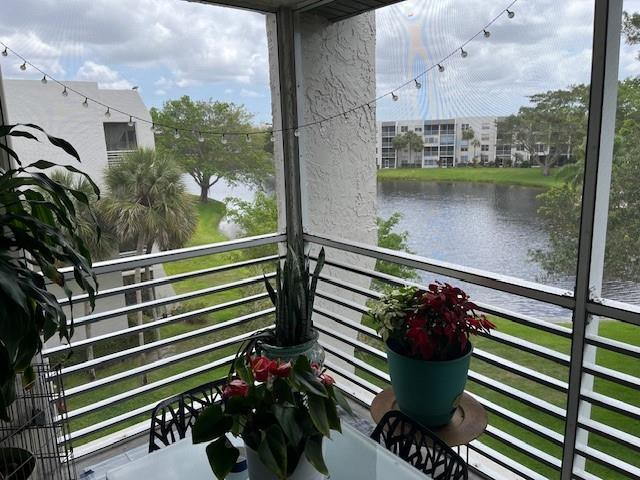Welcome and enjoy RESORT LIVING in this very well-maintained community with lots of amenities, including COUNTRY CLUB MEMBERSHIP, golf, tennis, fitness center, social rooms, pool, restaurants.  MAINTENANCE INCLUDES: Water, Cable, Insurance, Parking, Garbage Collection & Much more!  This charming 2/2 condo with a great screened balcony has a lake view, upgraded kitchen, baths, tiles floors.  Excellent schools.  Location is perfect!  Shopping plaza, PUBLIX, UPS, etc. ALL NEARBY!!  595, I-95, Turnpike all minutes away!  Beaches and Port Everglades just 15' drive.  NO LEASING.  As per Association, 650 minimum credit score, 10% minimum downpayment.  Condominium has RESERVES. $175 Annual fee that is good to use in the Clubhouse restaurants. 650 Credit Score, 10% down on contract, 25% down for financing. Seller to pay assessment 2 of 3 assessments. Buyer pays balance $64.71/mo until 4/2042.