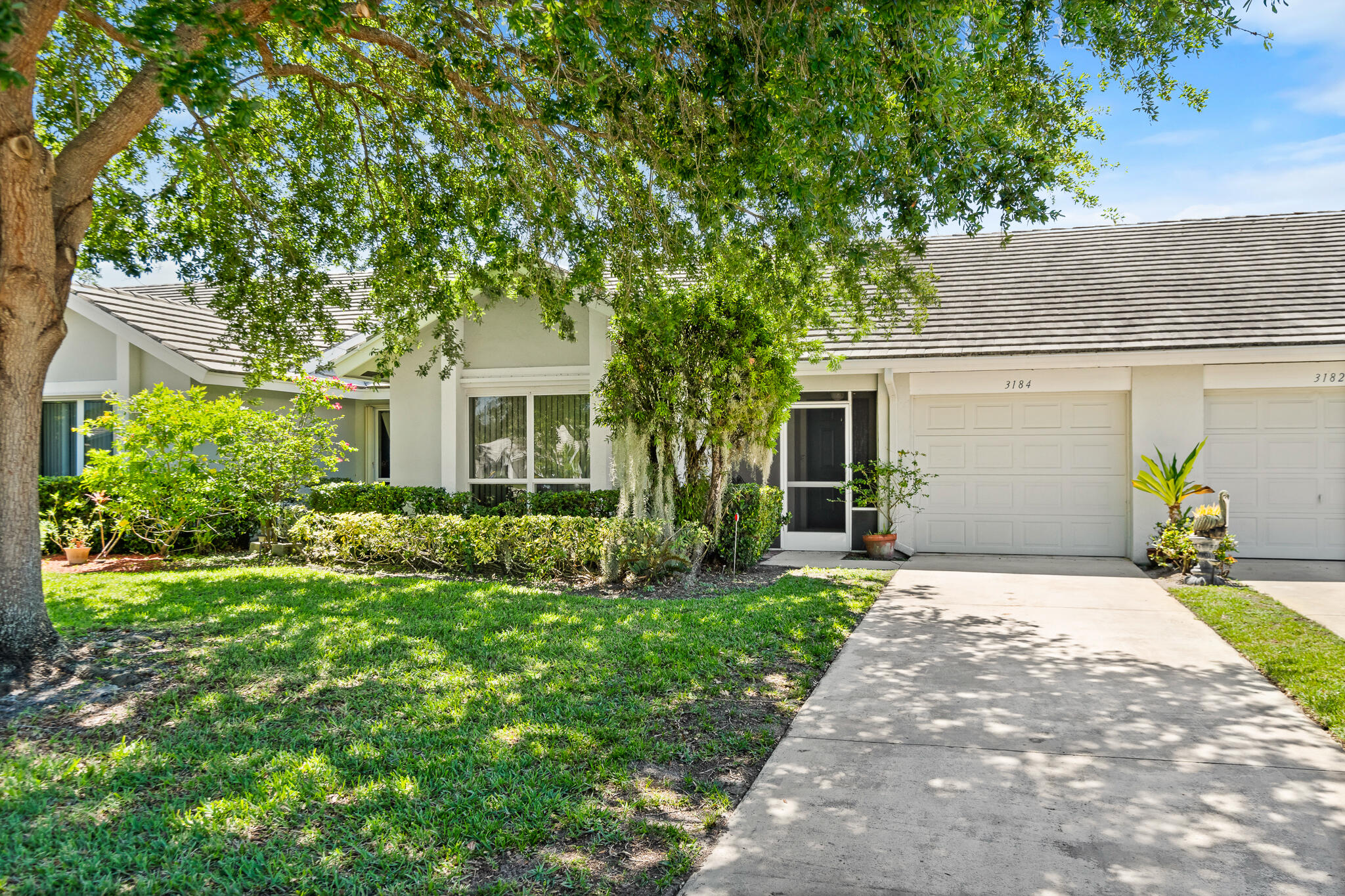 Located in the desirable Sunset Trace community in Palm City, this 3-bedroom, 2-bath townhome with a 1-car garage offers the opportunity to personalize while already having several important upgrades completed. Impact windows provide added storm protection and peace of mind. The kitchen features updated cabinetry and newer appliances, while bathroom vanities have also been updated. Carpet flooring was recently professionally cleaned, and the home is clean and move-in ready. Cosmetic updates to flooring and walls provide a buyer the ability to customize to their own style over time. Sunset Trace is an active all-age community offering two pools, gated entry, and HOA coverage that includes cable and internet. Conveniently located near shopping, dining, commuter routes, and A rated schools