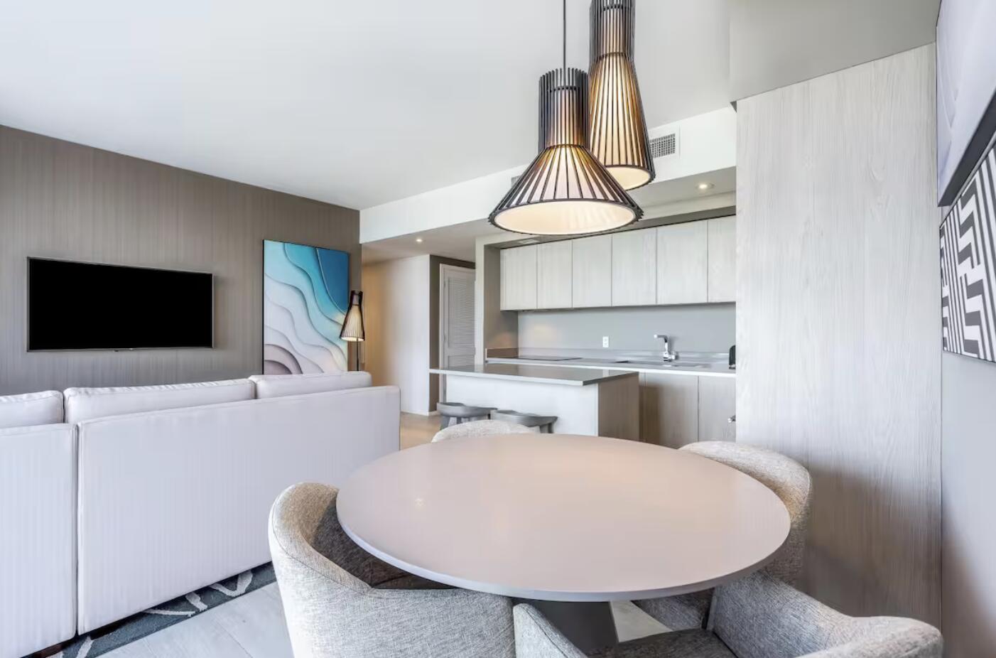 Exceptional investment opportunity with NO rental restrictions. Stunning 3/2 TURNKEY FULLY FURNISHED unit. Breathtaking views of the Intracoastal & city skyline. King-size bed in the primary suite, double beds and queen-size bed in the other guest bedrooms, making it ideal for maximizing occupancy & rental returns. Spectacular sunsets from every angle. A true resort lifestyle with 5-star amenities: infinity-edge pool, rooftop lounge, fitness center, spa, tennis, basketball, bbq, racquet courts. Exclusive beach club access with chairs, towels & umbrellas. 24-hr concierge and valet. Maintenance includes electricity, cable, internet, and water. Perfect to enjoy and rent short term either with the hotel rental program or by yourself (AirBNB, VRBO) in the most desirable beachfront destination.