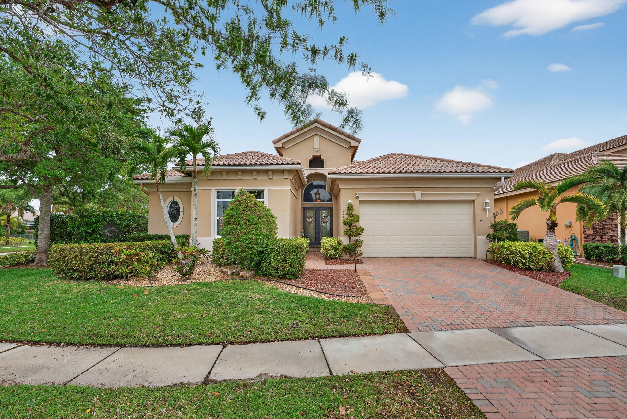 What a great 4/3 triple split floor plan home. This prized home offers all tiles floors in the living area & wood like floors in the bedrooms. Upgrades blinds & curtains throughout. Each bedroom has a huge closet & the primary bedroom has 2 walk in closets & a nook for a desk. Primary bath has his & her sinks, w/ a large shower & large soaking tub. Formal Dining, Living & Family Room w/ fireplace. The kitchen has a nook off of it to fit a table for a family to have meals at or use the countertop in the kitchen & make it easy for yourself. Textured walls & ceiling. Crown molding in all living area. Hurricane impact windows/doors. Huge screened in patio that is great for entertaining & another patio that hosts your very own 5-person hot tub. US News Reports Parkland as #1 Place to Live in FL