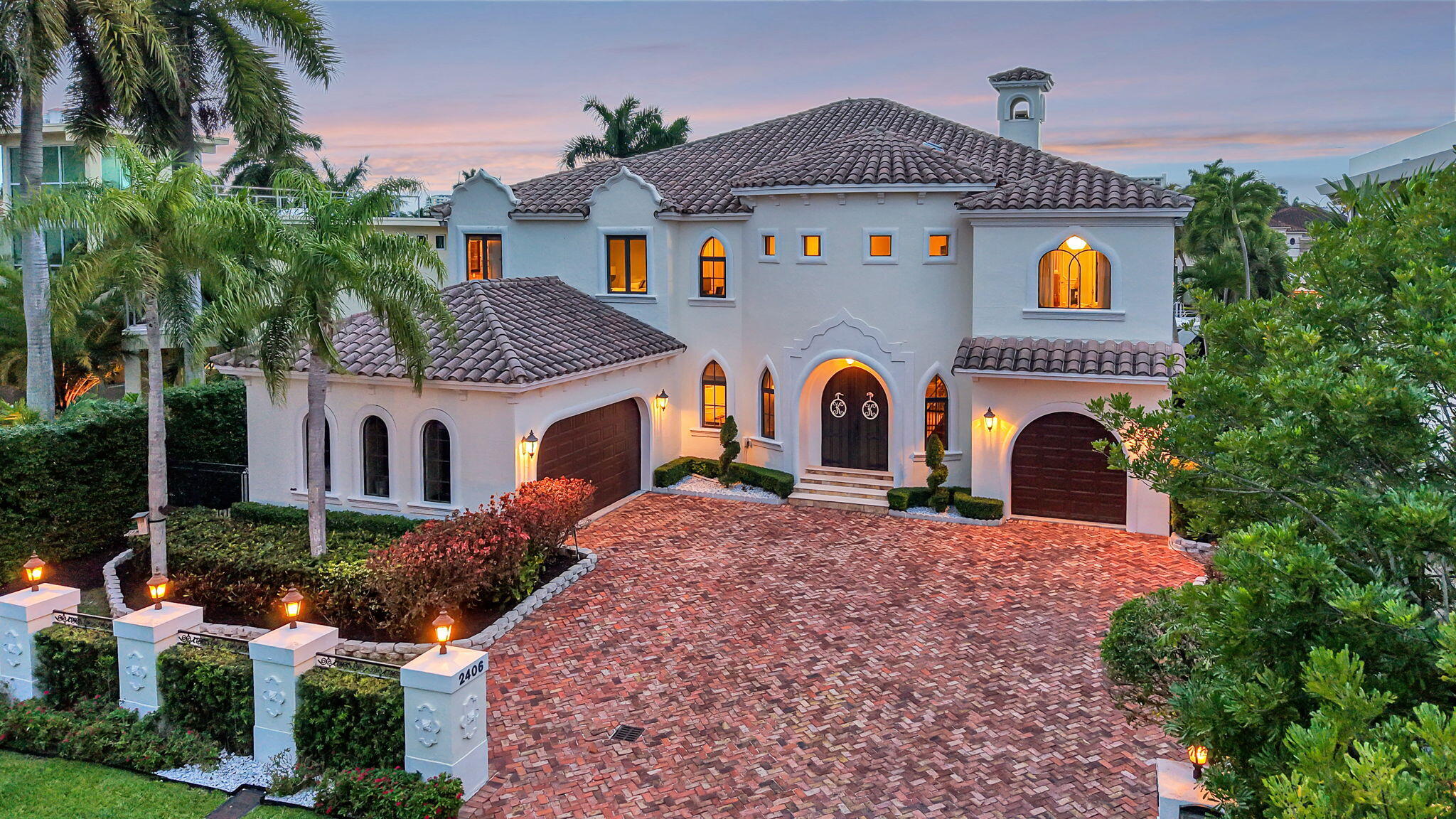 Located in highly desirable, guard house & security patrolled Seven Isles. This stunning transitional deepwater residence has so much to offer.  Elegantly designed with a highly functional & flexible floorplan.  Enjoy the formal entry with grand butterfly staircase, soaring ceilings in the formal living room with fireplace & great waterfront views.  Extremely large open kitchen, great room & bar area, large formal dining room plus a dedicated home office & home theatre plus 1st level bedroom suite. Upstairs loft game area plus split bedroom provides privacy to 3 spacious bedroom suites plus an incredible primary suite with sitting area, private balcony access, separate closets (one oversized) & spa style bathroom.  Entire residence boasts great natural light & is very welcoming.