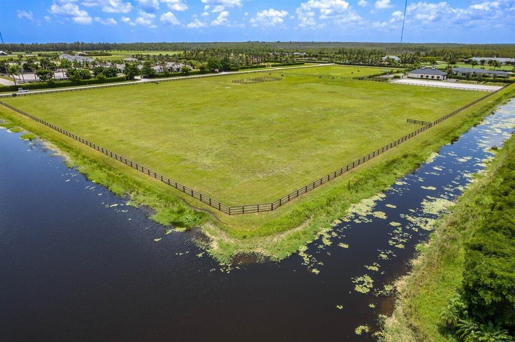 Outstanding opportunity to build on 13+ acres of cleared, high & dry land in the private gated equestrian community of Wellington Preserve. Enjoy the convenience of paved roads, underground electric and city water, while embracing the feeling of wide open space. Don't miss the chance to build your home and equestrian dream!