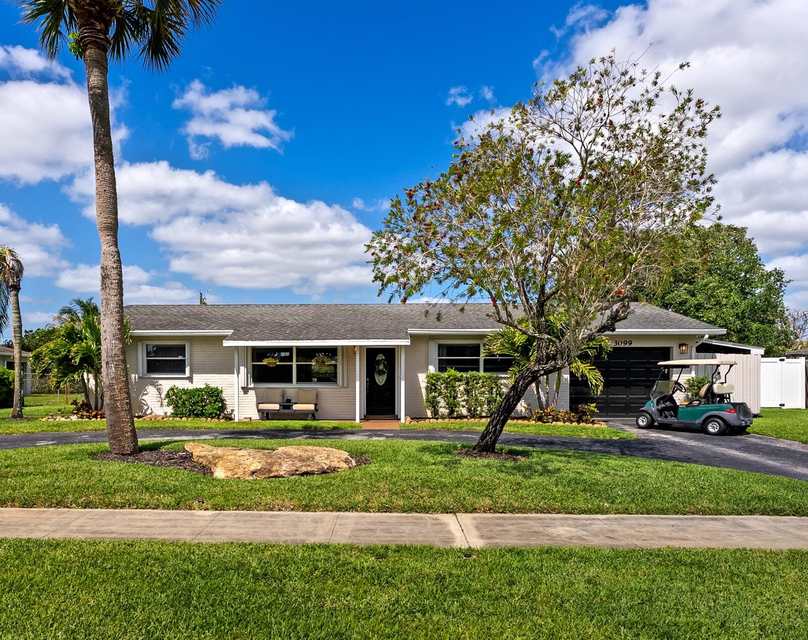 Tucked within a sought-after golf community, this charming updated 3 bedroom, 2 bath home offers a rare combination of freedom, space, and lifestyle without the restrictions of an HOA. A circular driveway provides ample parking and welcoming curb appeal, with additional room for your boat or RV.  Step into a backyard designed for both relaxation and entertaining. The expansive outdoor space features a saltwater pool, a gazebo perfect for shaded gatherings, and a spacious back porch ideal for hosting.  Located within a vibrant golf course setting, residents enjoy access to family-friendly amenities including a restaurant, driving range, and an active, welcoming atmosphere for all ages. This property truly delivers the flexibility you want with the lifestyle you've been looking for.