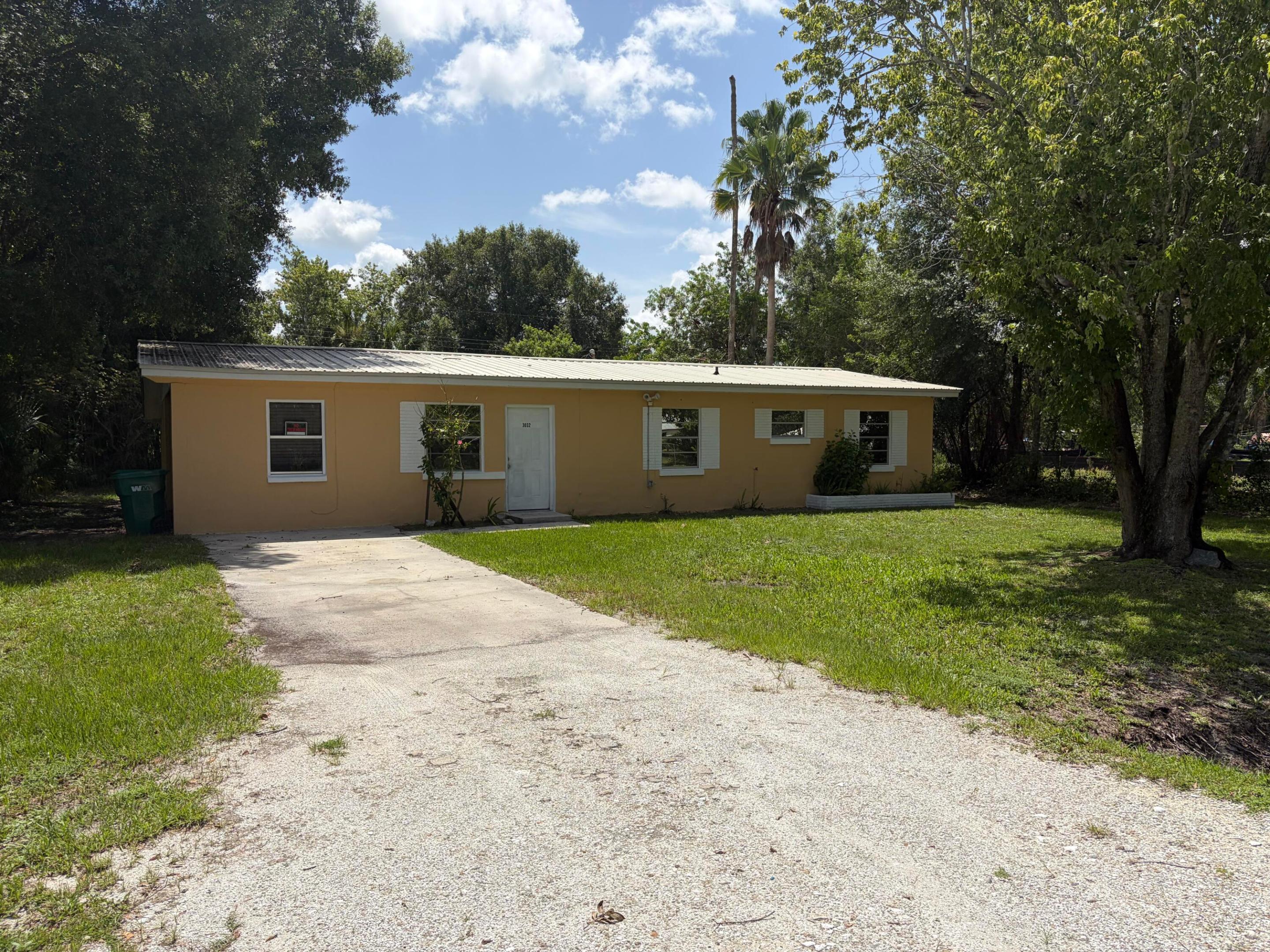 Updated 3BR/2BA Home with Bonus Room, Screened Patio & Major System Updates! Don't miss this opportunity to own a move-in ready 3-bedroom, 2-bath home that's been aggressively priced for today's market! With the expensive updates already completed—including a metal roof (approximately 10 years old), 2017 central A/C, and a brand-new 2025 water heater—you can enjoy peace of mind from day one. Inside you'll find a bright, functional floor plan with a spacious living area, a well-appointed kitchen featuring ample cabinet space, a large bonus room that's perfect for a home office, family room, playroom, or flex space, plus the convenience of an interior laundry room. Step outside to one of the home's best features—a huge screened-in patio overlooking the spacious backyard, creating the perfect setting for entertaining, relaxing, or enjoying Florida's beautiful weather year-round.  If you've been comparing new construction, you'll appreciate the value, extra living space, mature setting, and affordable price this home offers.