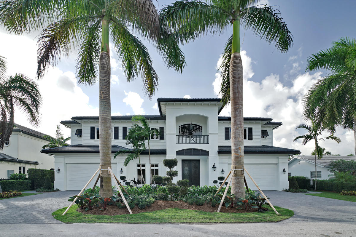Brand new home built by By Design completed November 2015. This home is light and bright and designed in a transitional style. Grand foyer entry leading to an incredible clubroom/library combination. Features include a second floor master bedroom with his and her bathrooms, covered loggia, private pool/patio area and beautiful tropical landscaping. 5th bedroom can be used as a loft area. Buyer to pay documentary stamp taxes on the deed and title insurance.