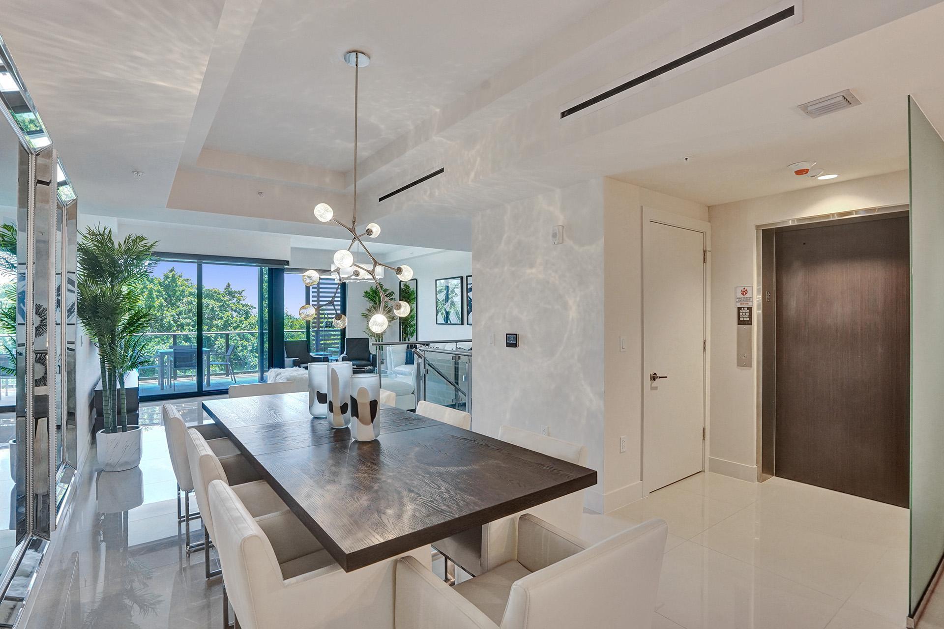 Live by the beach in a newer sophisticated residence w/elevator entrance directly into your home! Fully furnished with a luxurios decor, this 3 bedroom, 3.5 bath 2-story unit has peeks of the ocean & is only 300 steps to the beach. Kitchen has Subzero & Wolf appliances incl. wine fridge & gas cooktop, is fully equipped & offers a 10' breakfast bar with seating. Every bedroom has full bath & balcony. 10' ceilings w/a large & spacious floorplan. 2-story clubhouse with pool,jacuzzi, bbq lounge area, bar, fitness center, billiards table. 2 spaces inside secured parking garage. Waterfront dining, shopping, beach & new Publix opening any day. Storage unit on-site. Live the good life during your stay here.