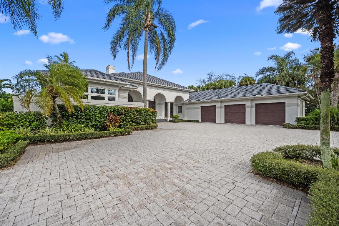 This Custom-built residence is thoughtfully designed to capture the essence of privacy, and timeless elegance within one of Jupiter's most prestigious gated golf communities. Set on a beautifully landscaped homesite, the home offers expansive living spaces, refined architectural details, and seamless indoor-outdoor flow ideal for both relaxed living and elegant entertaining.
The spacious interior features soaring ceilings, and abundant natural light throughout. A well-appointed primary suite serves as a private retreat, complemented by 2 baths and generous custom closets. Guest suites are equally inviting, offering comfort and privacy for family and friends.
Outdoor living is elevated with serene views and ample space to enjoy the Florida lifestyle, whether hosting intimate gatherings or simply unwinding in a peaceful setting. Residents of The Loxahatchee Club enjoy world-class amenities including a Jack Nicklaus Signature golf course, clubhouse, dining, tennis, fitness, and a vibrant social calendarall just minutes from the beach, marina, and fine dining.
A rare opportunity to own an estate property in one of Jupiter's most sought-after communities.
