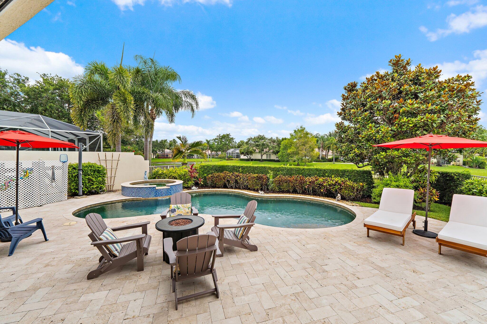 Tucked away in a quiet and peaceful setting, this beautifully maintained single-story pool home offers the perfect blend of comfort, privacy, and Florida living. Filled with natural light, the open floor plan features soaring ceilings and inviting living spaces that seamlessly flow to the outdoor oasis. The stunning view of the resort-style self-cleaning pool and spa creates a relaxing backdrop for everyday living and entertaining.  The updated kitchen is appointed with granite countertops, stainless steel appliances, and ample space for gathering with family and friends. Additional interior features include crown molding, custom built-in cabinetry, and porcelain tile flooring throughout.  Thoughtfully updated in 2021, the home features a whole-house water filtration system, new porcelain  tiles floors, and beautifully renovated bathrooms. Step outside to the private backyard retreat, creating the perfect space to relax and enjoy the tranquil surroundings. Additional features include phantom screen enclosure on the patio, quality updates, and exceptional indoor-outdoor living, this home is a true hidden gem.