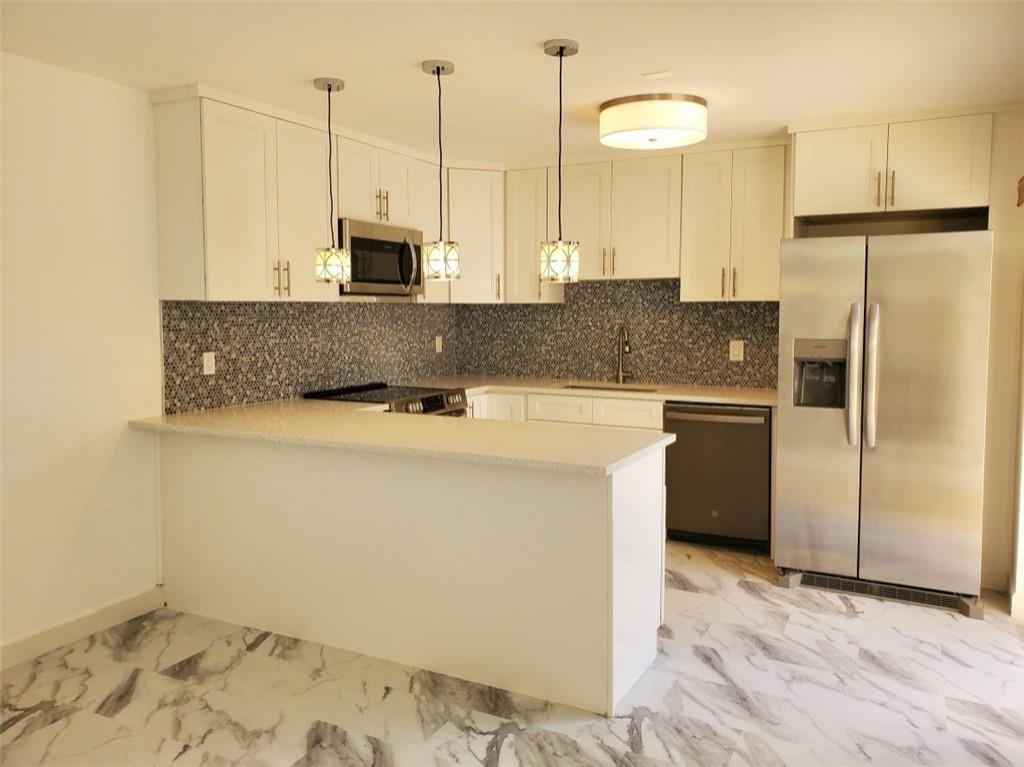 BRAND NEW !! With all the upgrades.No popcorn ceilings here(2022)!New A/C (2022),new kitchen cabinets(2022),s/s appliances,newer electrical box,new dbl mstr bath,vanity & shower,new 2nd bath(2022), laminate floors on 1st (2022) &2nd level. 2,assigned parking spots,1 upfront.Washer & Dryer ground level.Private fenced courtyard. 2 pets welcomed 25#s max or 30#s for both.Best Kept Secret in Delray is Rainberry.55+ community Close to trendy Downtown Delray,beach.dining,entertainment,boutique stores crafts,art shows & more.theater ,live shows,10 Har-Tru courts,Tennis teams,full-time Tennis Pro,tennis Club to keep us vibrant and healthy, Pickle ball Park contains 8 lighted Har-Tru courts,Bocce Center,5 Pools/ Hot tub. gated community, manned 24 hours a day.No lease until 2 yrs owned