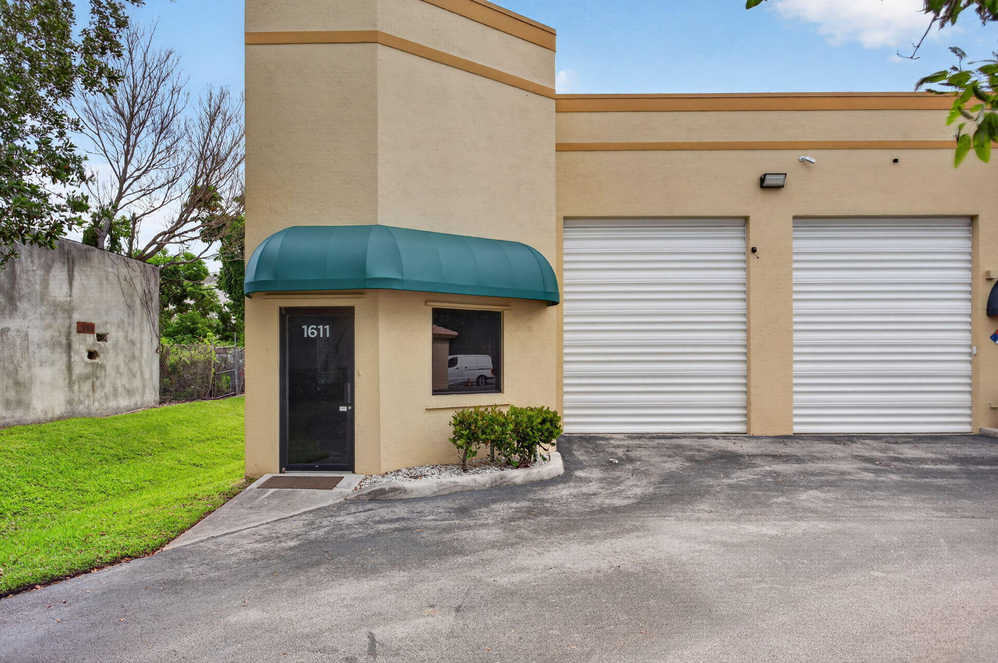 Pristine Condo warehouse in uniquely situated small development with easy access to thoroughfares. Community recently replaced roof, painted, and replaced awnings. Corner unit, impact glass. 14' garage door. Two zones of A/C-  Air conditioned throughout. 240' ground level office plus newly updated 230' mezzanine office. Epoxy floors. Zoned B3. Perfect for small business or personal storage. Turn key. Ready for new owner. Community Fees are $2165 per quarter.