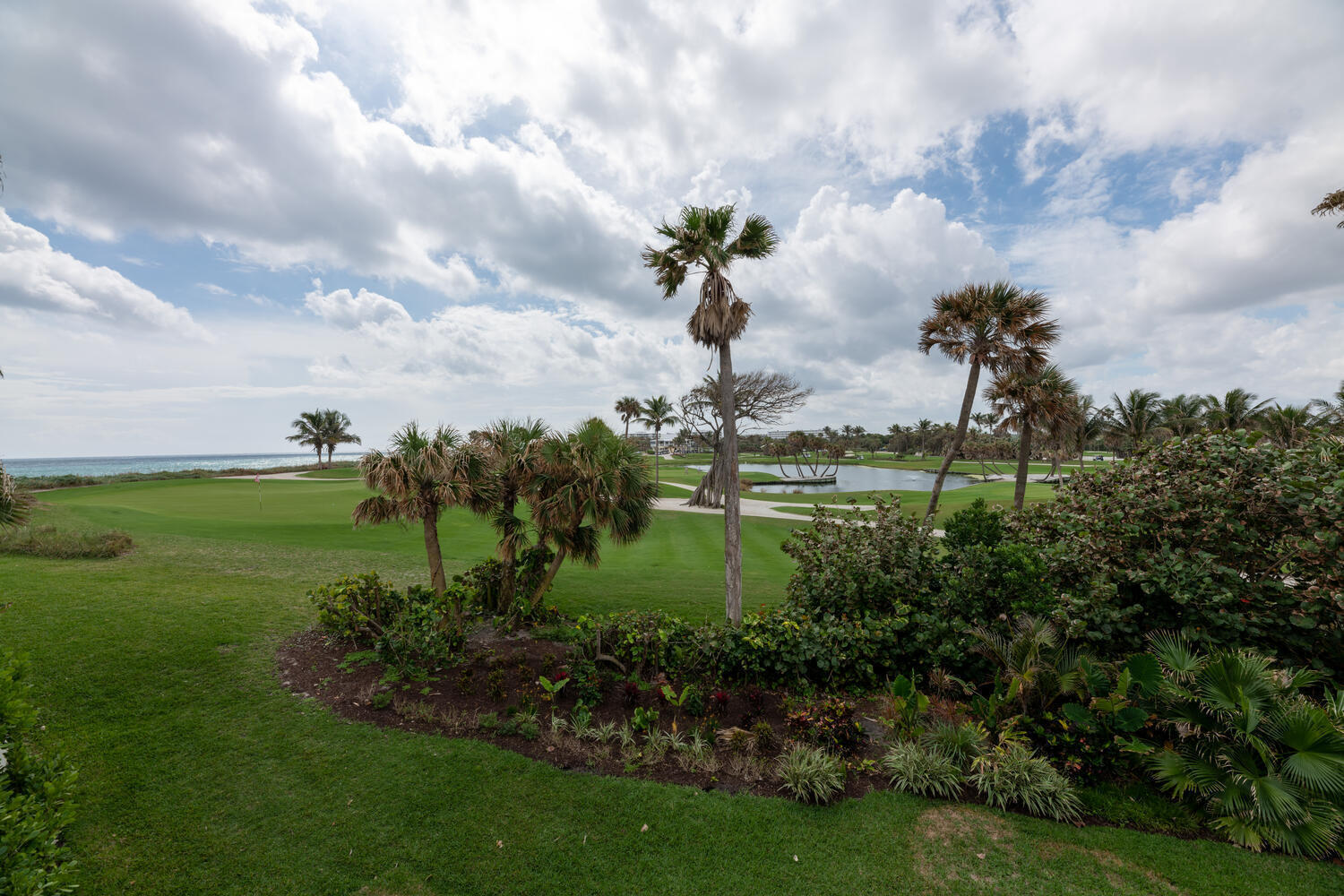Sweeping vistas across the Palm Beach Par 3 and views of the ocean will mesmerize the most discerning client. Enjoy a 3 Bedroom, 3.5 Bath townhouse that lives like a single family home steps from the beach. This Tres Vidas end unit was completely renovated by Pat Segraves, Dunworth Construction and Chelsea & Co. It offers an open floor plan, soaring ceiling heights, generous balconies, an elevator, ample storage throughout, and a two-car garage with an additional storage room. The development boasts a tennis/pickleball court, pool, and deeded access to a wide and private beach. Enjoy the amenities of the south end: Al Fresco, Acqua Cafe, the Phipps Tennis Center, Palm Beach Par 3, Benny's on the Beach and the weekly Farmers Market near the pier just to name a few.