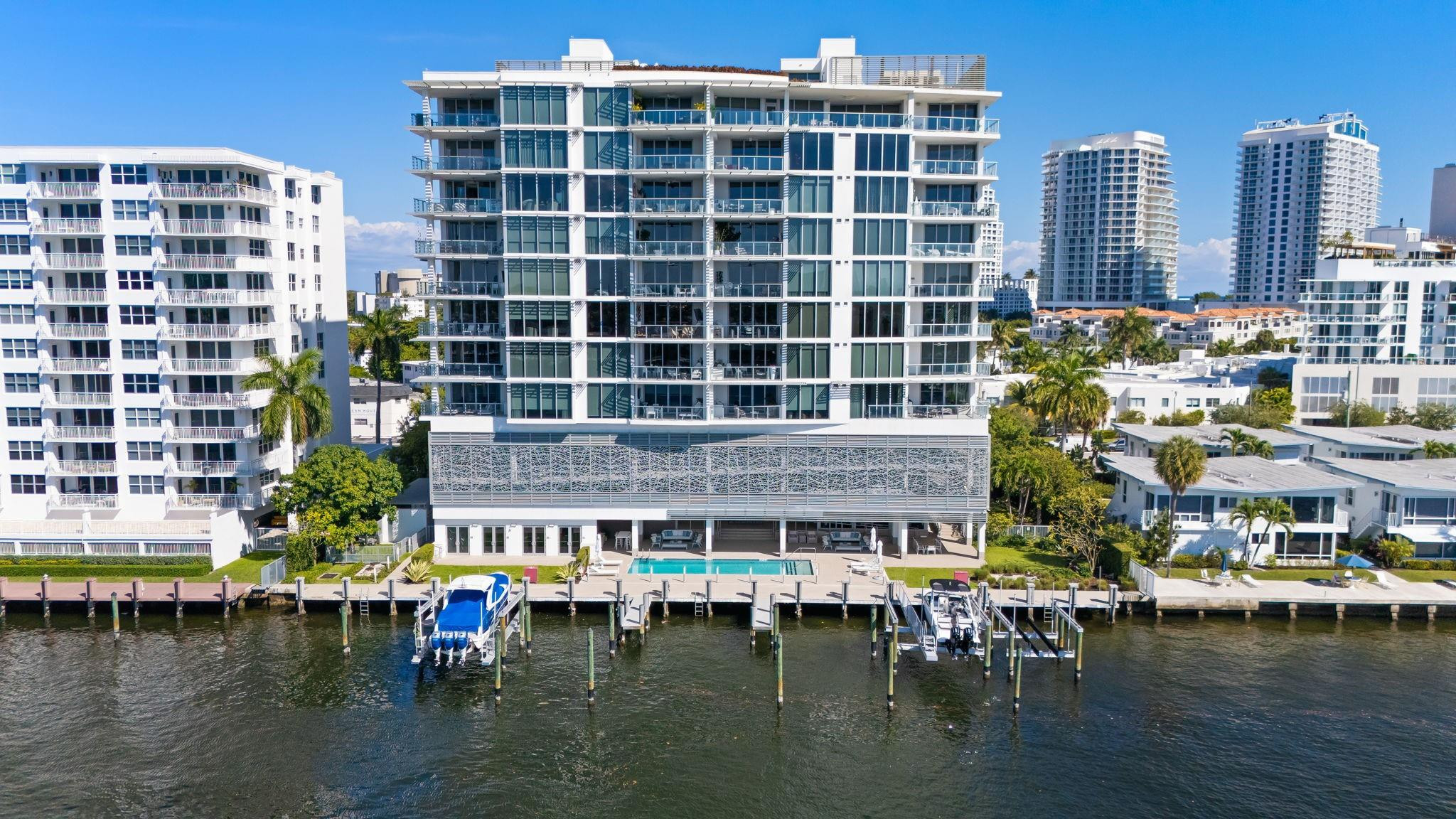 “This premier, flow-through Adagio residence is the only unit offering a private 53ft boat slip, boat lift, and exclusive cabana, setting it apart as the building’s most complete waterfront home. Generous terraces, floor-to-ceiling glass, and stunning Intracoastal and skyline views define the open, light-filled interior. Designer lighting, custom finishes, and high-end upgrades elevate every space. Italian designed gourmet kitchen with Gaggeneau appliances with gas cooking. Enjoy outdoor entertaining with your private Summer Kitchenl, plus resort-style amenities including a rooftop pool with ocean vistas, state-of-the-art fitness center, residents’ lounge, landscaped waterfront decks, and beach access moments away. Perfect for avid boaters seeking direct water access, protected views.