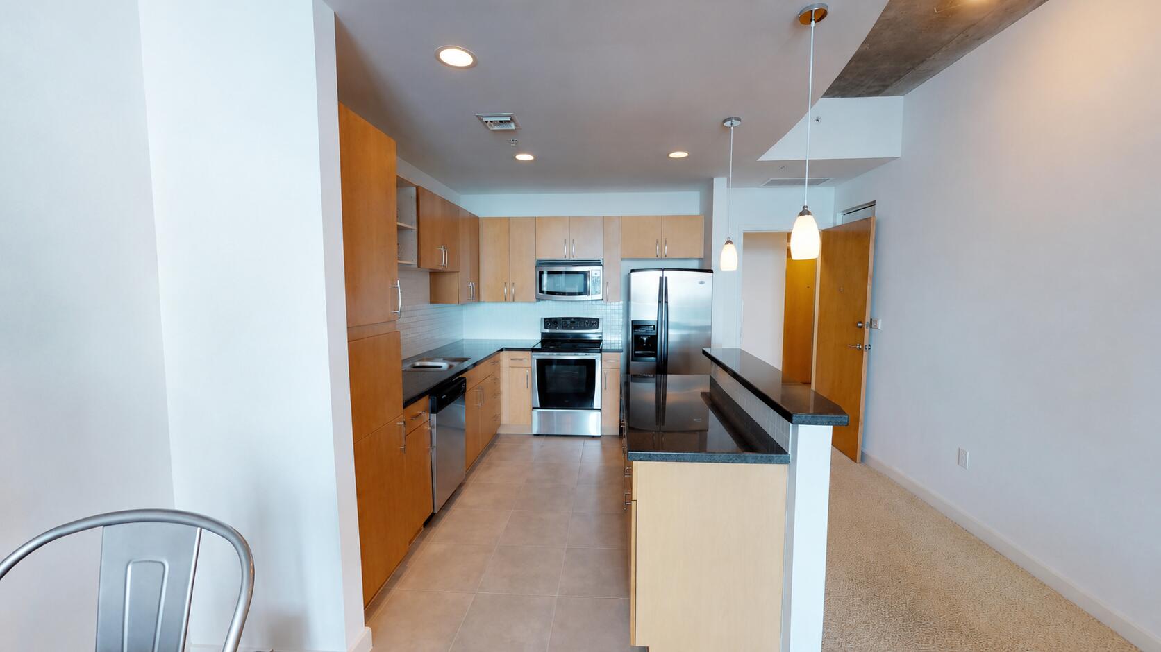 Experience the perfect blend of New York loft-style living and South Florida resort ambiance at The Edge in Downtown West Palm Beach. This stunning one-bedroom, one-bath residence features soaring 18-foot ceilings and dramatic floor-to-ceiling glass, creating an open, light-filled space with a chic urban feel. Enjoy picturesque lake and sunset views framed by swaying palm trees, providing a tranquil backdrop to your everyday lifestyle.  Ideally located just moments from Downtown West Palm Beach's premier dining, shopping, entertainment, and waterfront attractions, this unique residence combines contemporary design, breathtaking scenery, and exceptional convenience. Residents enjoy resort-style amenities and an unbeatable Palm Beach location, making this an  outstanding primary residence, seasonal getaway, or investment opportunity.  Property is being offered as a short sale and is subject to lender approval. There is currently an approximately $42,000 HOA lien against the property. Listing agent believes the lien may be negotiable and may be able to obtain a reduction once a contract is secured; however, no guarantees are made or implied. An HOA foreclosure auction is currently scheduled for July 7, 2026, so time is of the essence.  All terms, price, agent related items, and seller concessions are subject to lender and third-party approval. Buyer is advised to conduct all due diligence and verify all information independently. Exceptional opportunity to own a distinctive downtown residence with tremendous upside in one of West Palm Beach's most desirable locations.