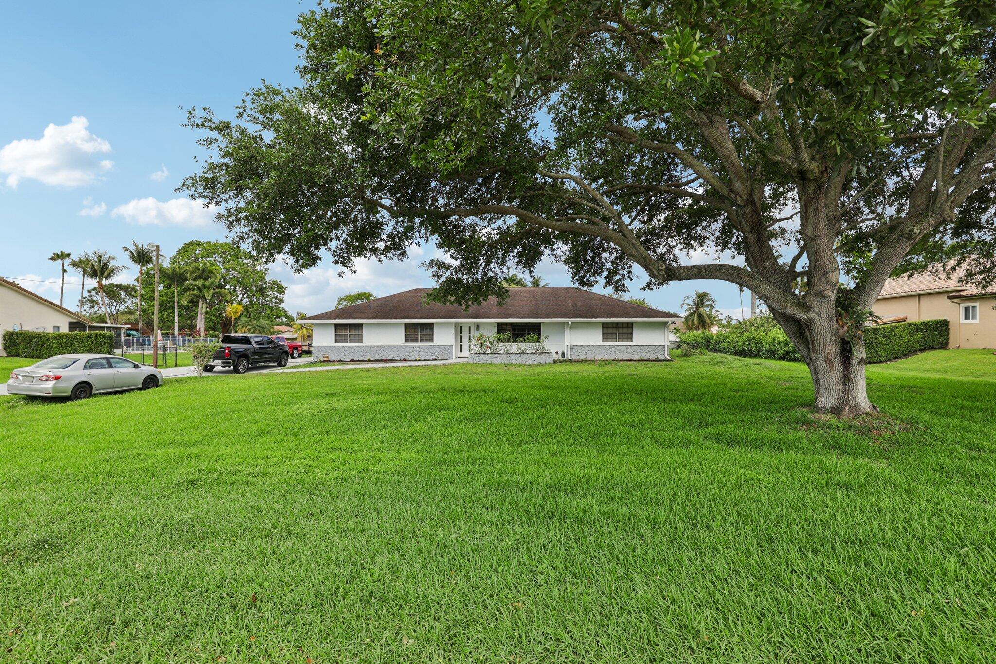 Beautifully remodeled West Davie home on a 35,247 sq ft lot with canal views and no HOA. This spacious property features 5 bedrooms, 4.5 bathrooms, and a private 1-bedroom, 1-bath apartment—ideal for extended family or rental income. Enjoy generous living areas, a large updated kitchen with ample counter space and cabinetry, and LED recessed lighting throughout. The outdoor space offers a pool, covered patio, and plenty of room for entertaining. 2-car garage plus driveway parking for 5+ cars. Expansive backyard includes a shed and chicken coop. The separate apartment provides flexibility for guests, multigenerational living, or income-producing opportunities. Tasteful upgrades throughout with quality materials. Prime location near top-rated schools, dining, and entertainment. A rare combination of space, functionality, and privacy.