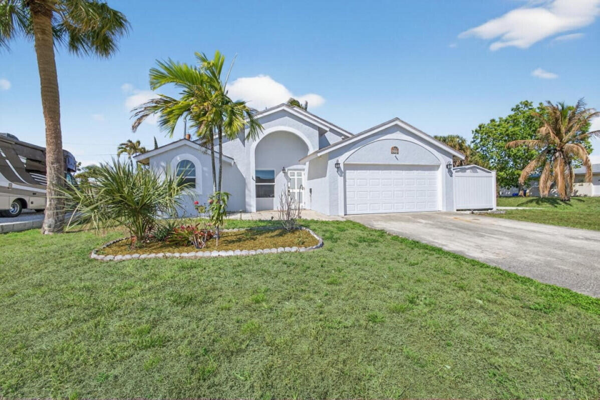 Very spacious 3-bedroom, 2-bath home in a prime Jupiter location close to everything, especially Abacoa. This well-maintained property features impact glass windows, a generator, and a screened-in patio perfect for relaxing or entertaining. Inside, you'll find both a living room and a separate family room, offering plenty of space for everyday living and gatherings. The home has been thoughtfully updated and provides a comfortable, functional layout. Enjoy plenty of parking along with a two-car garage, making it ideal for guests. Conveniently located near shopping, dining, parks, major roadways and ALL that Abacoa events have to offer.
