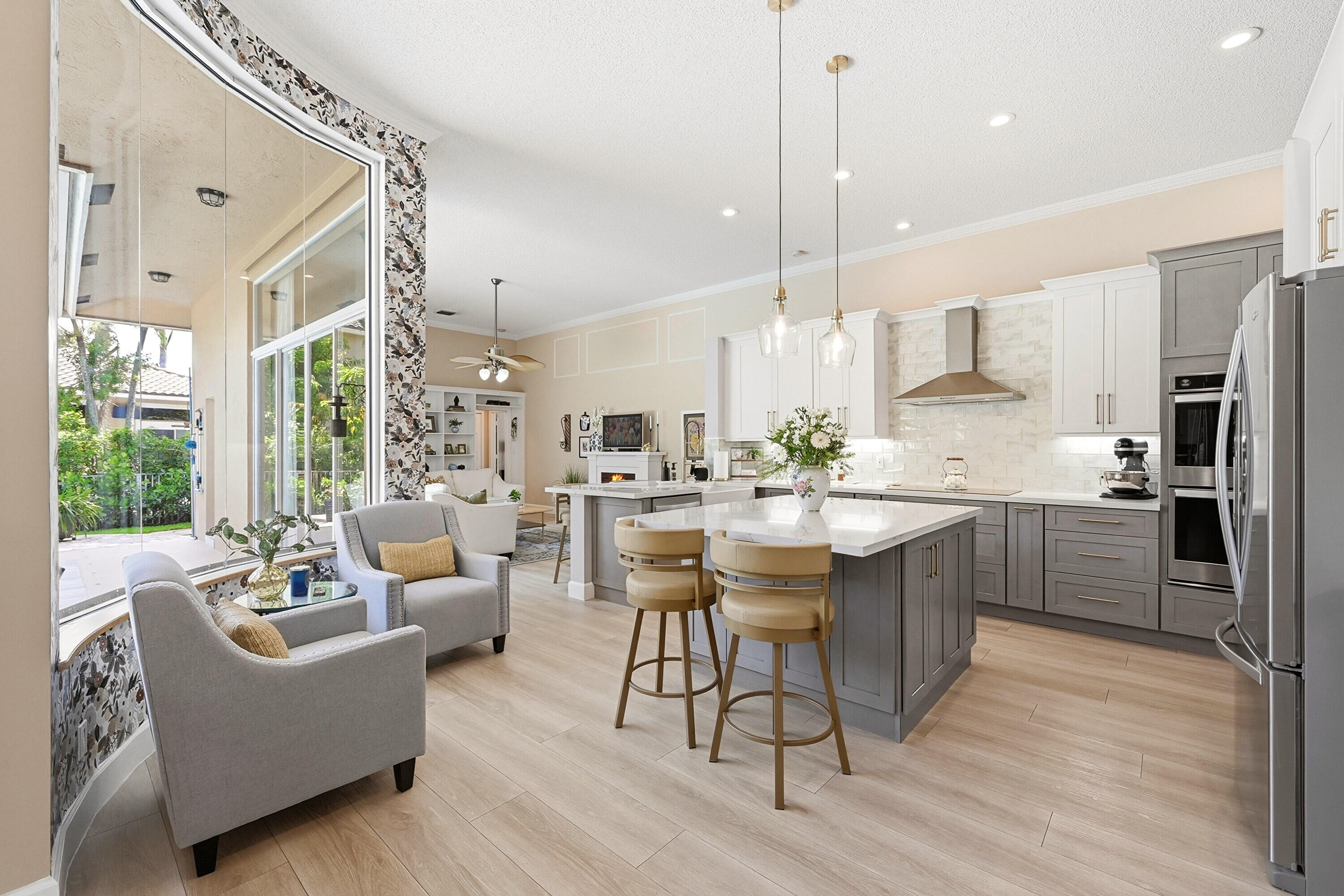 Welcome to one of Kensington Glen's most sought after single story floor plans. A rarely available 6/4 masterpiece offers over 2,700 sq ft of beautifully designed living. The triple split layout delivers unmatched flexibility, whether you need guest suites, multiple home offices, or room for multigenerational living. The heart of the home is a dream kitchen with exceptional storage, an induction range, dual ovens & the kind of workspace that makes every day cooking enjoyable. A spacious 3 car garage, central vacuum, and an oversized fenced lot add to the comfort & convenience. Step outside to a completely remodeled pool, protected by a baby fence, & enjoy the benefit of well water, keeping utility costs low. This home is equipped w/ full hurricane protection, 2010 roof, 24 A/C and 25 WH.  Located in one of Coral Springs' most desirable communities with very low HOA fees ($800 annually) on a cul -de-sac and zoned for Stoneman Douglas High School, this property blends space, style, and value in a way that makes it easy to imagine packing your bags — because once you're here, you'll never want to leave.