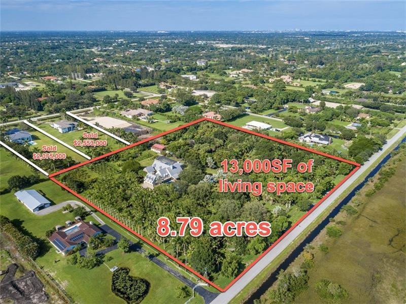PRICE SLASHED OVER ONE MILLION DOLLARS! Reduced for quick sale. This impressive, peaceful, tranquil 8+ acre compound with over 13,000SF shows immense pride of ownership! Perfect for a family, corporate retreat or sub-dividable investment (4 separate parcels allowed). Privately gated 5BR/5.2BA main house features impeccable kitchen, elevator, 65' lap pool, steam shower, summer kitchen, 3-car garage + carport with 240V plug-in power. Completely separate 3,000SF guest house boasts 3BR/3BA, 2 kitchens, offices and living space. Additional pole barn provides storage for all the toys, land/earth moving equipment. Currently enjoys agricultural exemption (for low property taxes). This is a dream property!