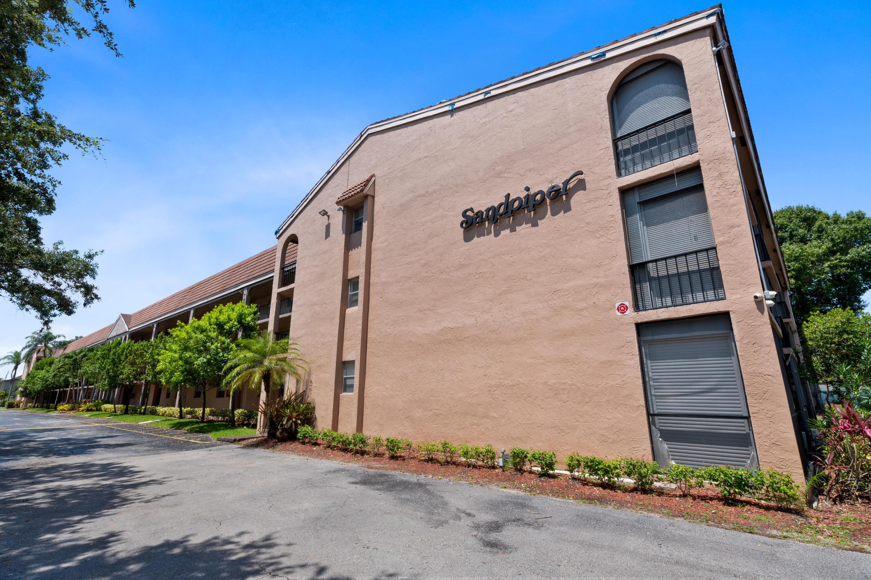 Come see this beautiful 2 bedroom, 2 bathroom condo located in the heart of Coral Springs. This unit features tile and laminate flooring throughout, no carpet. Large living room space. Lots of closets for storage. Enjoy the spacious screened in balcony over looking the community pool. Full size washer/dryer located in the unit. One assigned parking and guest parking available. Close to plenty of shopping, restaurants and so much more.