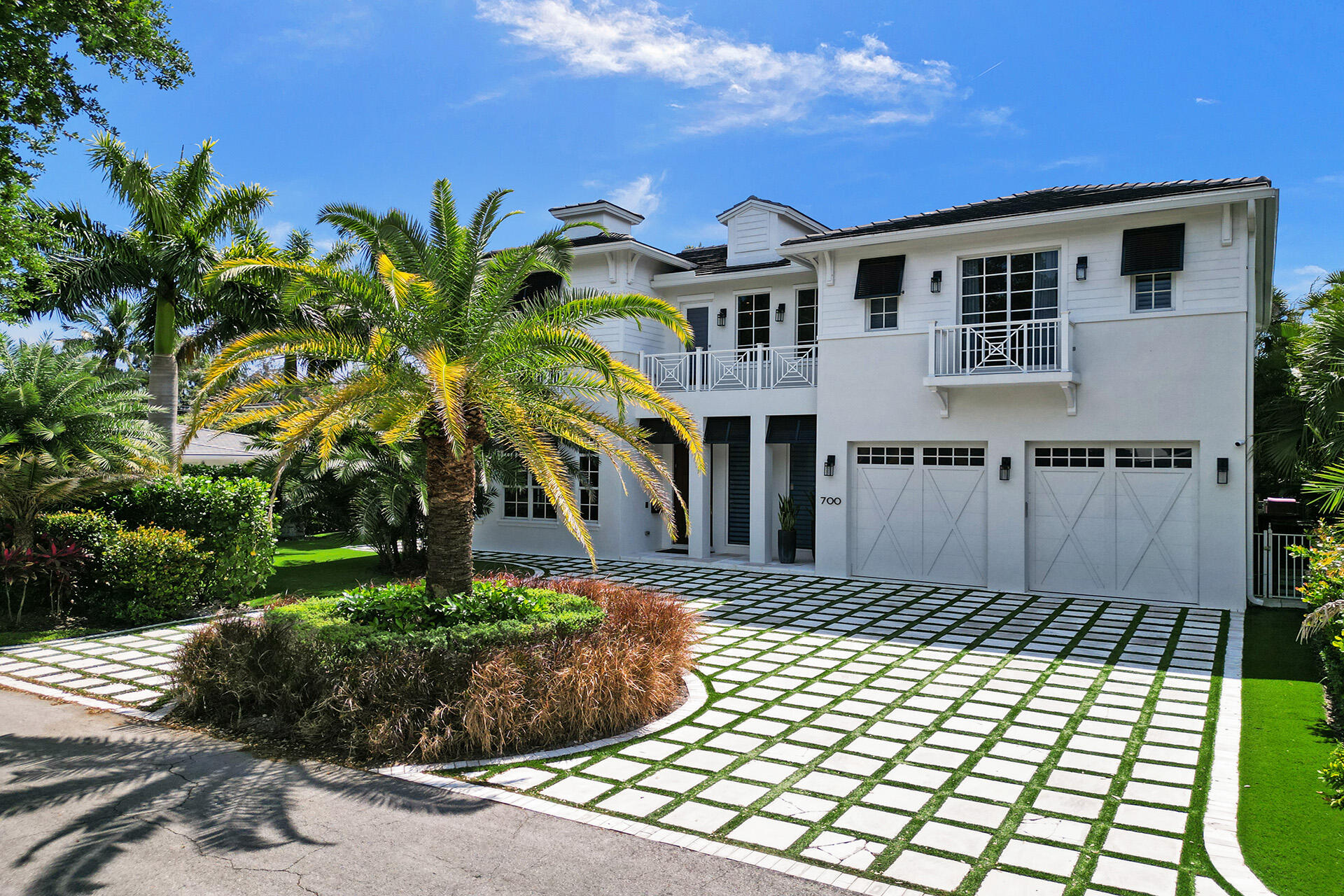 ''WELCOME TO MODERN LUXURY AT ITS FINEST'' This stunning 5 bdr 5.1 bath home was built in 2020 beautifully nestled in Tunison Palms/Old Floresta neighborhood. It offers a coastal inspired, light & airy modern feel. This home features a spacious open floor plan with imported designer finishes, high end gourmet chef's kitchen with a large island, plenty of storage and top of the line appliances! Custom closets, Restoration Hardware lighting, impact glass sliding doors through the home that bring the outdoor living in. Five en-suite bedrooms that have their own balcony. Italian porcelain tile floors throughout. Artificial turf lawn surrounded by gorgeous, lush landscaping, heated pool and lanai. Great location! Close to Mizner Park, beaches, Town Center Mall, FAU, I-95