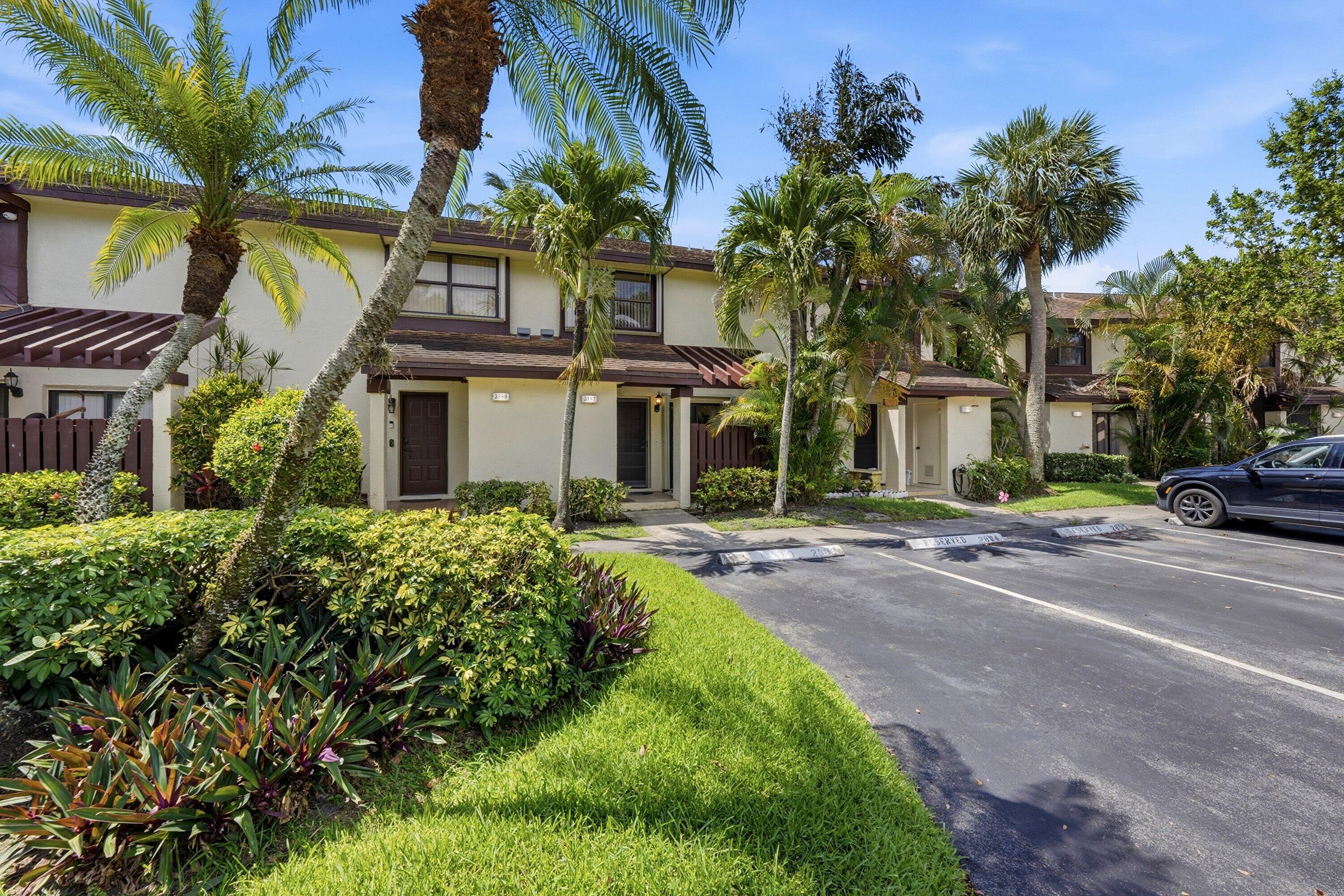 Spacious waterfront 2/2.5 townhome featuring TWO PRIMARY bedrooms located in sought after Coconut Creek, in Golden Raintree VI. The property is secured with accordion shutters for peace of mind and lower insurance. Upstairs has vaulted ceilings and laminate flooring - the downstairs has 18x18 tile - kitchen has granite countertops, stainless steel appliances and a decorative back splash - first floor laundry room with washer and dryer - community pool close to unit. Township resort style amenities include Olympic size pool, clubhouse, tennis courts, library, gym, sauna, performing arts center, bike/walking trails. Seminole Casino, Promenade Shops/Dining nearby.