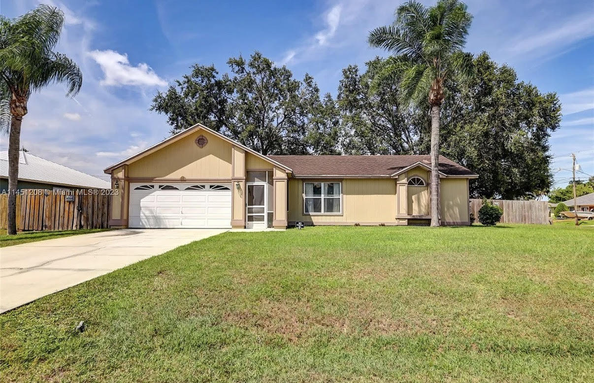 Beautiful 3-bedroom, 2-bath home in South Port St. Lucie with a new roof and brand-new AC. This home sits on a spacious corner lot with a large fenced backyard, perfect for family, pets, and entertaining.  The open floor plan features a family room, living room, and a split-bedroom layout for privacy. Additional highlights include a 2-car garage and plenty of storage space.  Conveniently located just minutes from shopping, schools, restaurants, and I 95, offering easy access to everything you need. A comfortable, move-in ready home in a desirable South Port St. Lucie neighborhood.