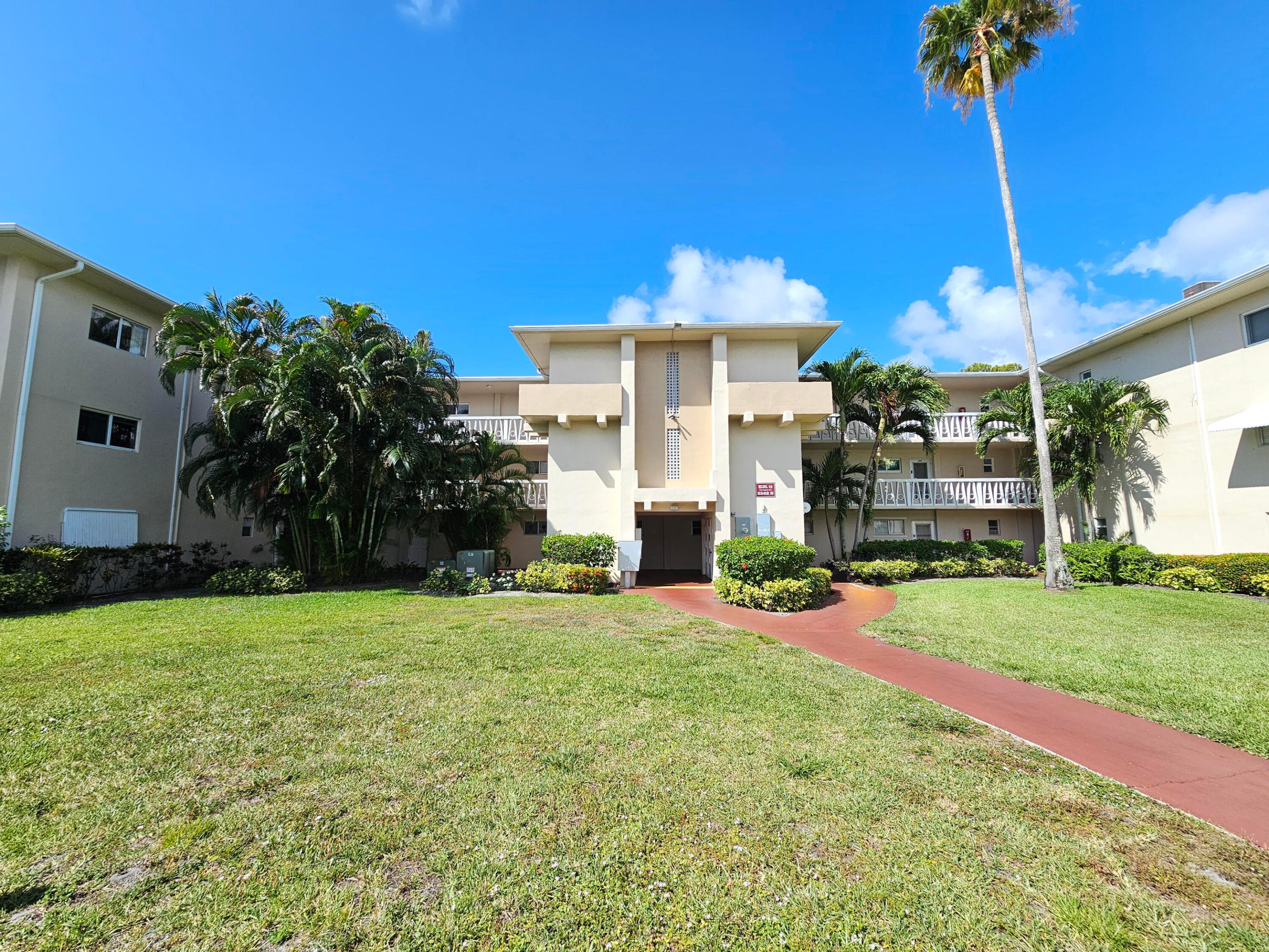 Come see this wonderful 2 bedroom / 1 bathroom move in ready corner unit in the HOPA community of Lake Clarke Gardens! As you enter you will notice the neutral tile and paint throughout. The kitchen has updated wood cabinets, stainless appliances, stone counters and a tiled backsplash. The bathroom has been updated and both bedrooms are spacious with plenty of closet space. The screened balcony is perfect for sipping your morning coffee or reading a book. The unit is located near the entrance and across from the clubhouse and community pool. Parking right outside your unit, with plenty of additional guest parking! Lake Clarke Gardens features many amenities such as two pools, saunas, BBQ areas, gym, library, billiards, ping pong, club house, putting green, shuffleboard and much more! Some images in this listing have been virtually staged.