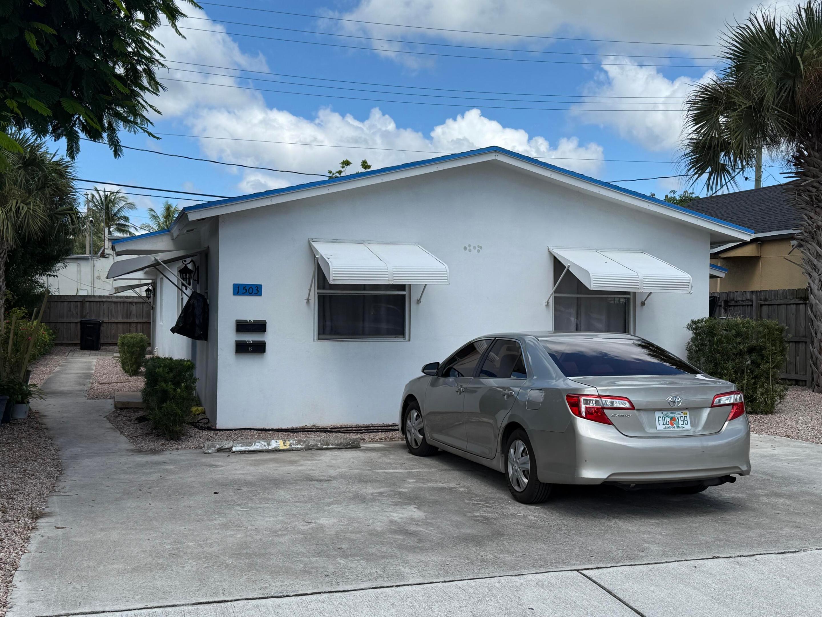 Beautifully renovated 2-bedroom, 1-bath front unit in a duplex, located in a desirable North Lake Worth Beach neighborhood. This bright and inviting home features porcelain tile flooring throughout, a modern kitchen with stainless steel appliances, an updated bathroom, and spacious living areas. Enjoy the privacy of a duplex while being conveniently located near shopping, dining, beaches, and major highways. Tenant is responsible for water, sewer, and electricity.