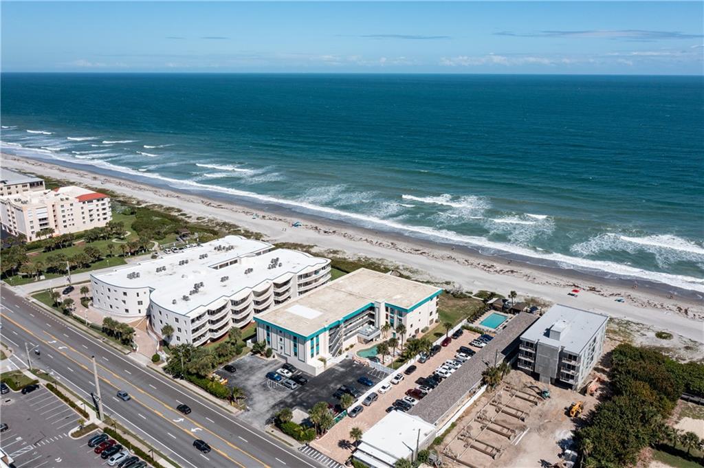 Enjoy the breathtaking views from the balcony of your top floor, Southeast corner, ocean front condo! This beautiful 3 bedroom, 2 bathroom unit was tastefully upgraded, offering the relaxing atmosphere you have been dreaming of. Perfect for year round residency, or as your beach front vacation home. Steps to the sand, or a short walk to the boardwalk, shops, restaurants, or the grocery store. Gated perimeter, covered garage parking with coded entry, full use of secure clubhouse and community pool!