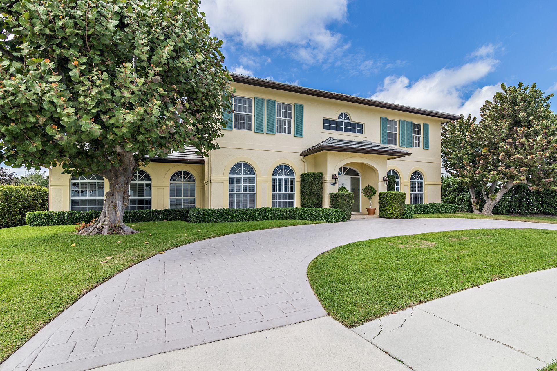 Located directly on Flagler Drive with unobstructed views of the Intracoastal Waterway rests this fabulous 1988 CBS constructed home with 5 bedrooms and 4.5 bathrooms. Boasting 5,710 total square feet under roof and situated on a 15,000+ sq. foot lot, this home features a traditional floor plan with a formal dining room located directly off of the oversized chef's kitchen, a formal living room located directly off of the casual family room and a large outdoor summer kitchen with covered loggia & dining overlooking the pristine backyard. Also incorporating full impact rated glass windows throughout and a 2020 new tile roof, this home is safe, free of leaks and simply in need of a little interior updating. The bonus to this waterfront home if the deeded dock across the street. This home comes with 50% ownership of the dock and 100% ownership of the 8K LB boat lift on the north side of the dock.  Close to area beaches, dining, shopping, I-95, PBI airport and directly on the Intracoastal Waterway.