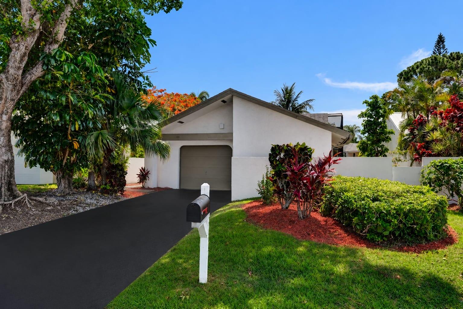 Welcome to this beautifully home in the gated community of Rainberry Lake in Delray Beach. Featuring a bright open layout, vaulted ceilings, spacious living areas, and a split bedroom floor plan for added privacy. Enjoy relaxing or entertaining year round from the screened patio. Conveniently located just minutes from Atlantic Avenue, shopping, dining, major highways, and Delray's beautiful beaches. A great opportunity to enjoy the South Florida lifestyle in a peaceful and centrally located community.