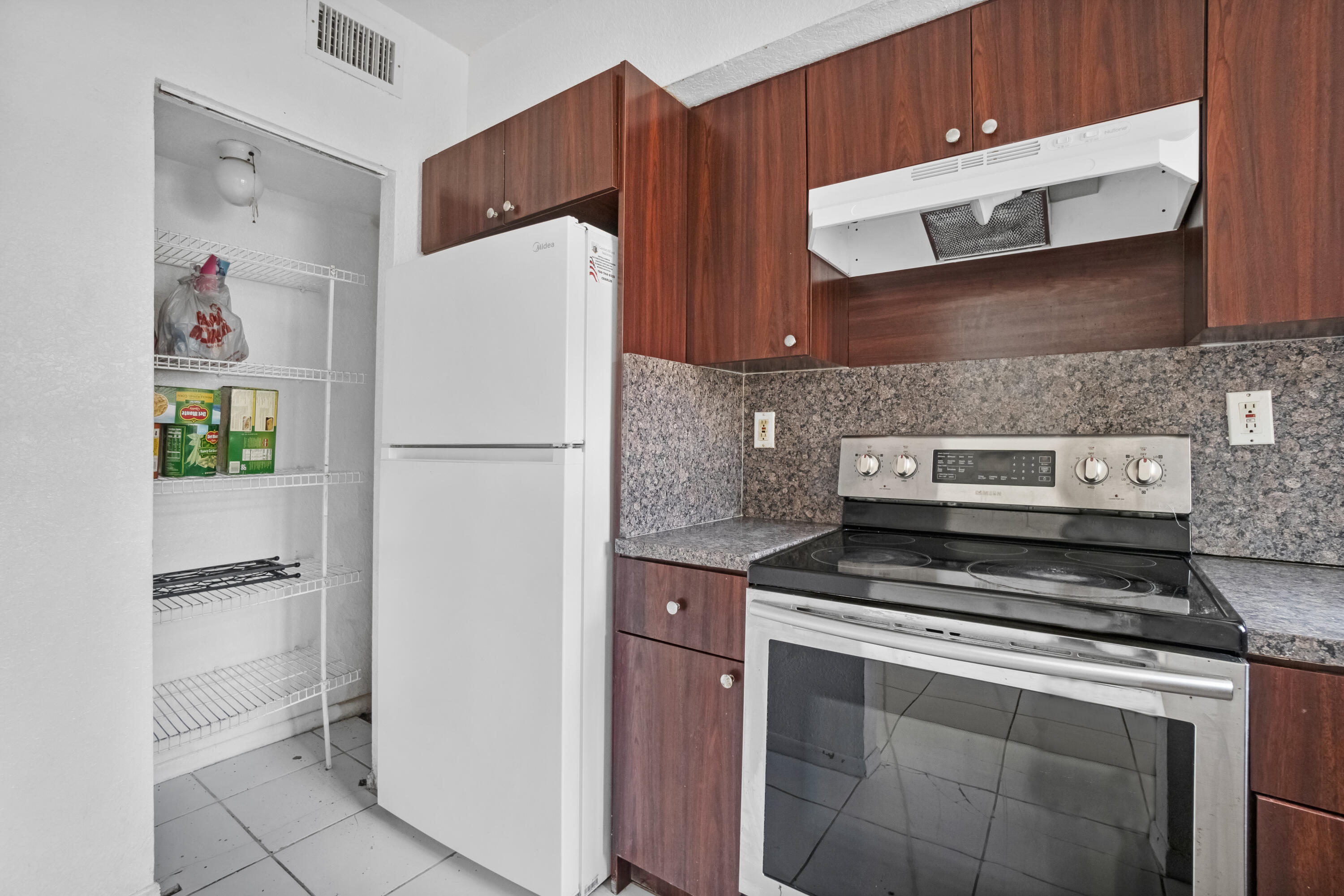 No rental restriction! Welcome to this 2 bedroom/2-story townhome in Miami Shores neighborhood. Brand new impact windows, No Carpet and washer/dryer inside unit. Home is conveniently located just minutes from I-95, Barry University, shopping, and more.  Need some updating and minor repairs.  Water, roof, and exterior paint are included in the low association fee.  All cash offers will be considered. Easy to show!
