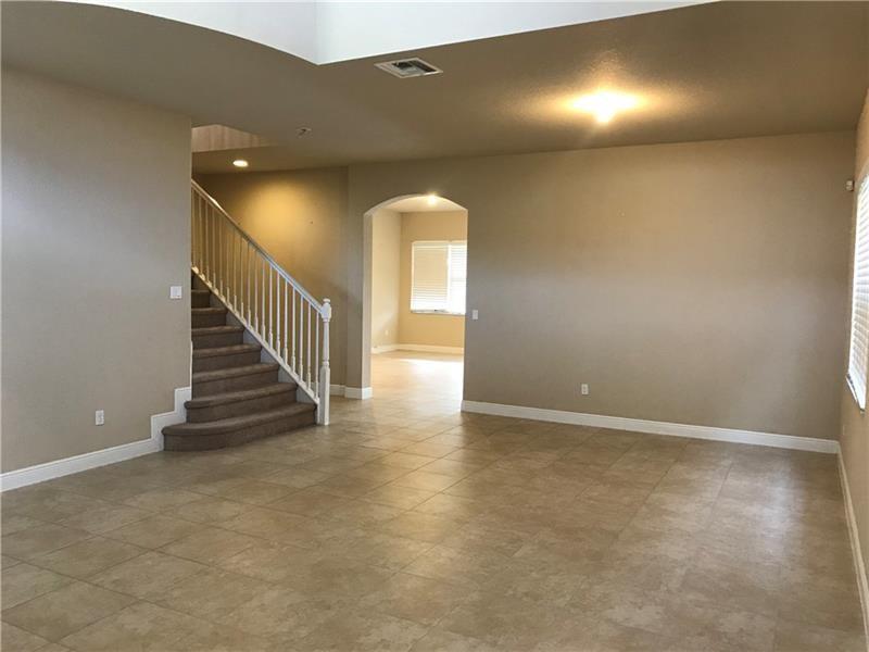 Beautiful 2 story 5 bed/4 full bath home in the impeccably maintained, guard-gated community of Miralago. Hurricane impact windows and doors. Huge upgraded kitchen with granite countertops, stainless steel appliances, gas cooktop and more. Keyless entry and remote security system. Tile floors throughout 1st floor. Incredible Clubhouse with huge resort style pool, full fitness center, basketball/tennis courts, game room and so much more. Close to Parkland A rated schools and minutes away from restaurants, shopping and highways.