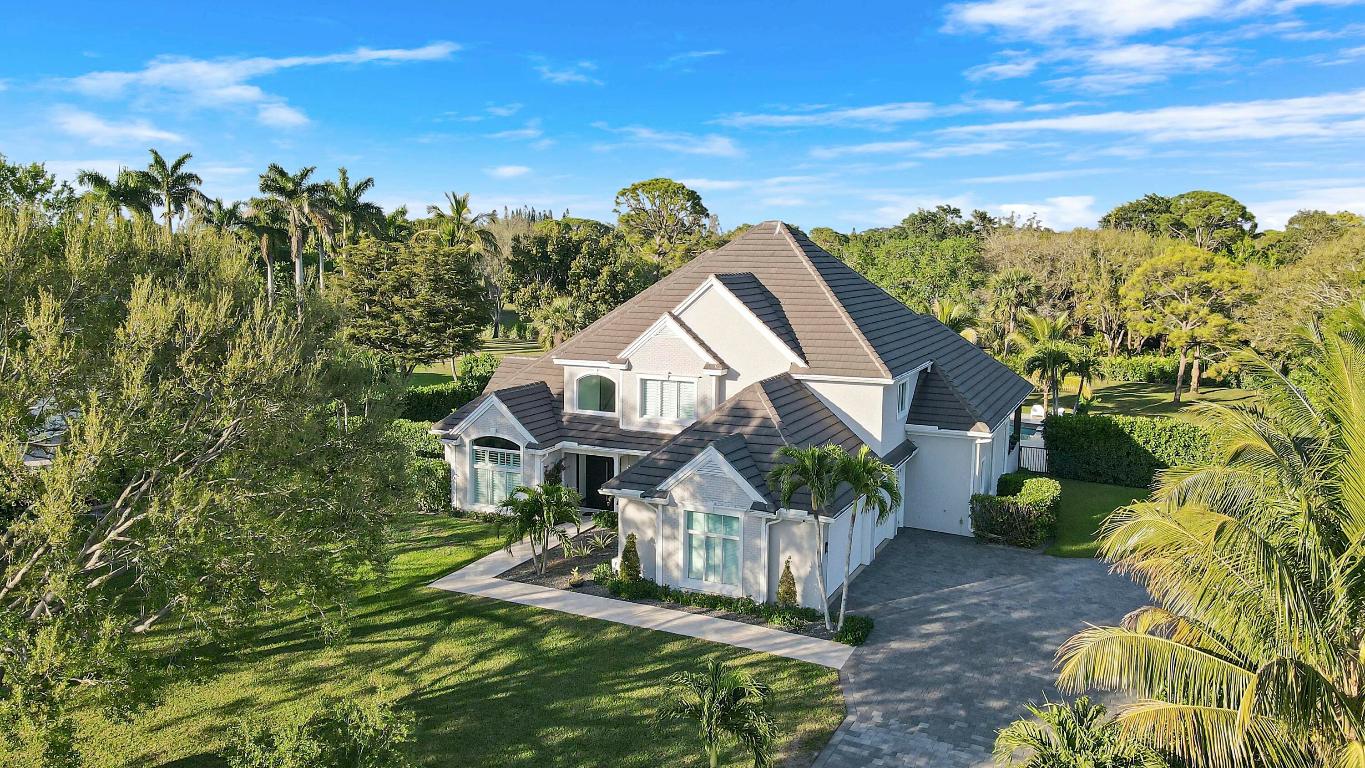 Stunning Custom Home with Unmatched Upgrades & Private Oasis!
This exceptional custom home has been completely transformed inside and out, featuring a top-to-bottom luxury remodel with high-end, European-imported cabinetry and state of the art appliances. Every detail has been meticulously designed to create a one of a kind living experience.
Nestled on one of the largest and most private lots in the community, the backyard is a true oasis—perfect for entertaining. Enjoy the newly added outdoor kitchen, expansive seating areas, and a stunning marble pool and patio deck, all set in a serene, private setting.
Inside, the redesigned open-concept floor plan enhances flow and functionality. The kitchen has been completely reimagined, while the custom floating staircase adds a striking architectural element. All four bathrooms have been elegantly renovated, and new designer tile flooring extends seamlessly throughout the home.
Additional highlights include:
-Brand-new impact windows and doors and roof for security and efficiency
-Insulated impact garage doors
-Show-stopping garage with polished concrete floors, custom cabinetry, and a car lift for four vehicles

In the gated community of Steeplechase, this home sits on a rare 1.5 acre lot and in prime location, offering both privacy and space in the heart of Palm Beach Gardens. This sought-after neighborhood is known for its custom estates and spacious lots, just minutes from top-tier shopping, dining, golf courses, and entertainment. Plus, it's less than 30 minutes from Palm Beach International Airport, Downtown West Palm Beach, and Palm Beach Island.

This is a rare opportunity to own a fully customized, move-in-ready masterpiece in one of the area's most desirable communities!