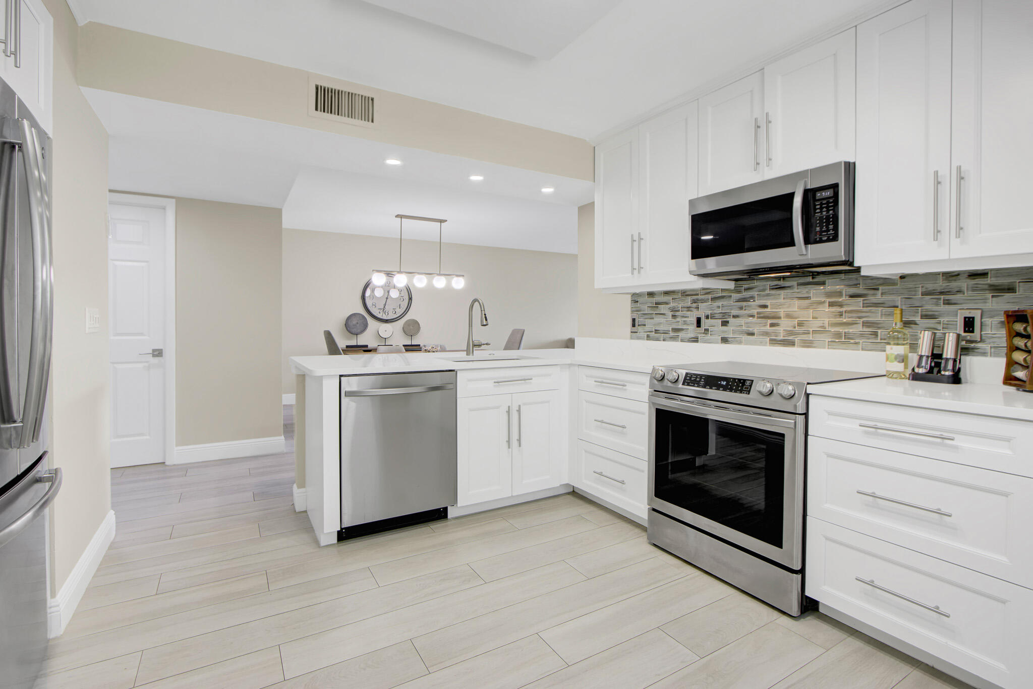 Discover effortless South Florida living in this completely renovated 2-bedroom, 2-bath condo in the sought-after 55+ community of Lakes of Delray. Every detail has been thoughtfully updated, creating a modern, move-in-ready home with stylish finishes throughout. Relax on your private screened balcony and enjoy the convenience of in-unit laundry. Residents have access to exceptional amenities, including a clubhouse, pool, fitness center, tennis, pickleball, and countless social activities. Ideally located just west of vibrant downtown Delray Beach, you're only minutes from award-winning restaurants, shopping, entertainment, major highways, and the area's beautiful Atlantic beaches.